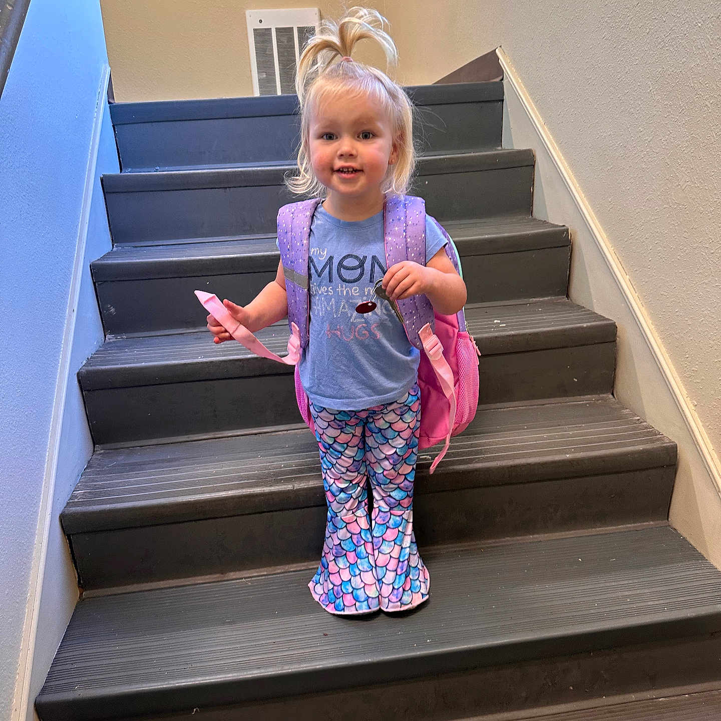Emma joined the competition — help win amazing prizes! accessories, architecture, bag, building, child, clothing, face, female, girl, hardwood, head, house, housing, pants, person, photography, portrait, sitting, staircase, wood