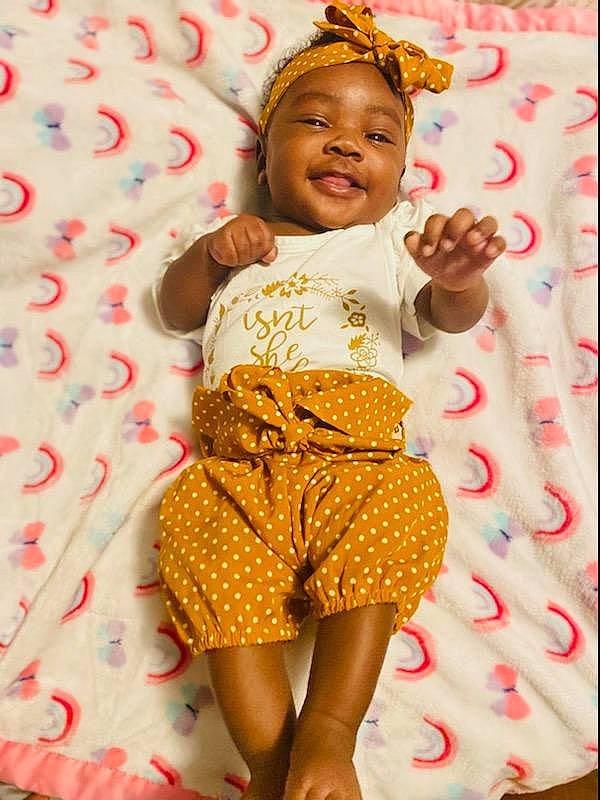 Kamaro joined the competition — help win amazing prizes! baby_toddler_clothing, child, dress, eye, face, fun, happy, head, headgear, human_body, joy, pattern, person, pink, skin, sleeve, smile, textile, thigh, toddler