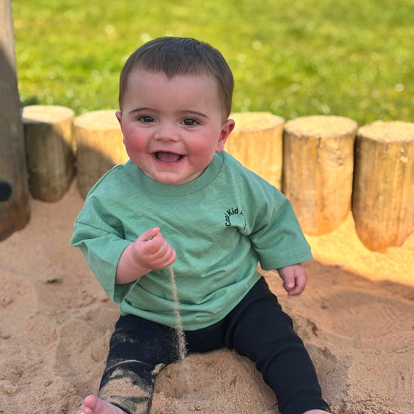 Olly joined the competition — help win amazing prizes! baby, clothing, face, grass, head, nature, outdoorplayarea, outdoors, pants, park, person, photography, plant, playarea, portrait, rock, summer, tree, water, wood