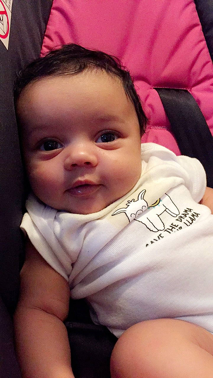 Jasmine is registered to the contest to win money with this photo: baby, cheek, child, eye, eyebrow, face, forehead, head, lip, mouth, nose, person, pink, skin, smile, toddler