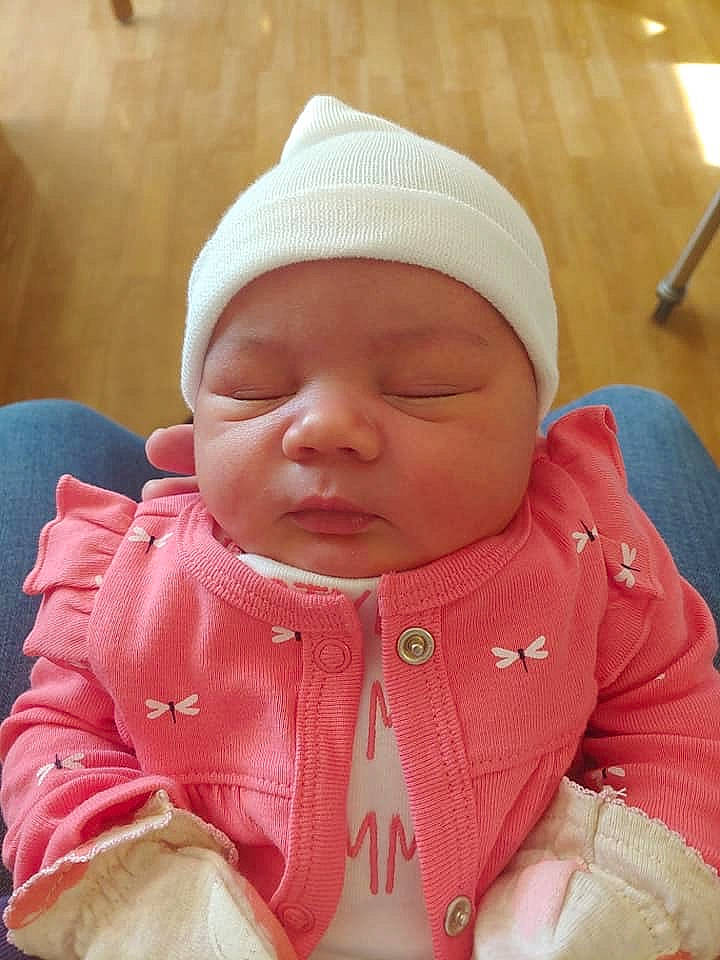 Jasmine is registered to the contest to win money with this photo: baby, cheek, child, headgear, headwear, lip, mouth, nose, person, pink, skin, toddler