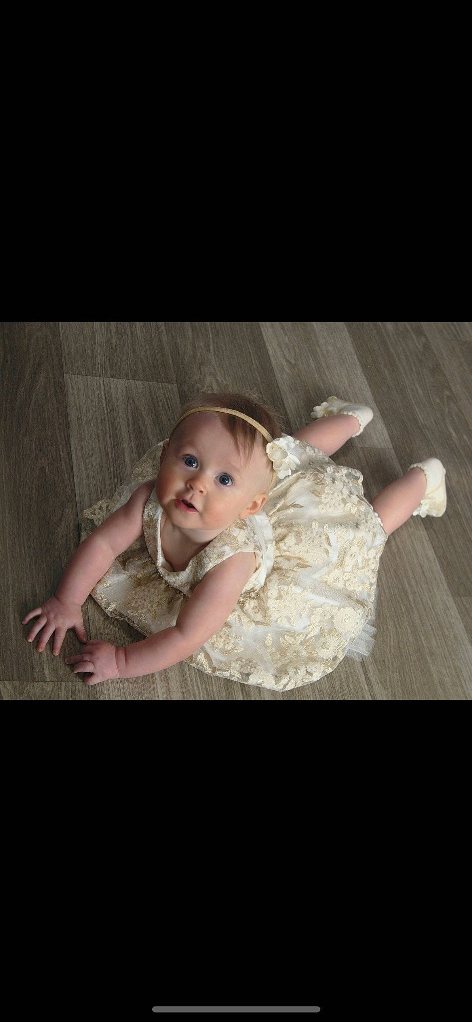 Amelia Mae joined the competition — help win amazing prizes! baby, baby_toddler_clothing, cheek, child, comfort, darkness, dress, event, flash_photography, flooring, fun, happy, hardwood, human_body, iris, person, room, sitting, sleeve, toddler