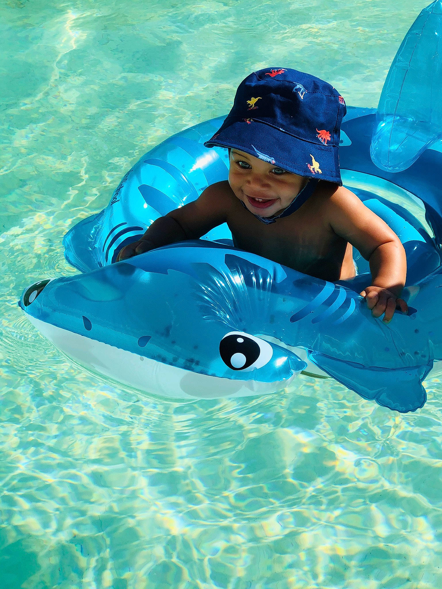 Quincy is registered to the contest to win money with this photo: aqua, cool, diving_equipment, fun, games, headwear, joy, leisure, person, personal_protective_equipment, recreation, swimming, swimming_pool, vacation, water, wetsuit