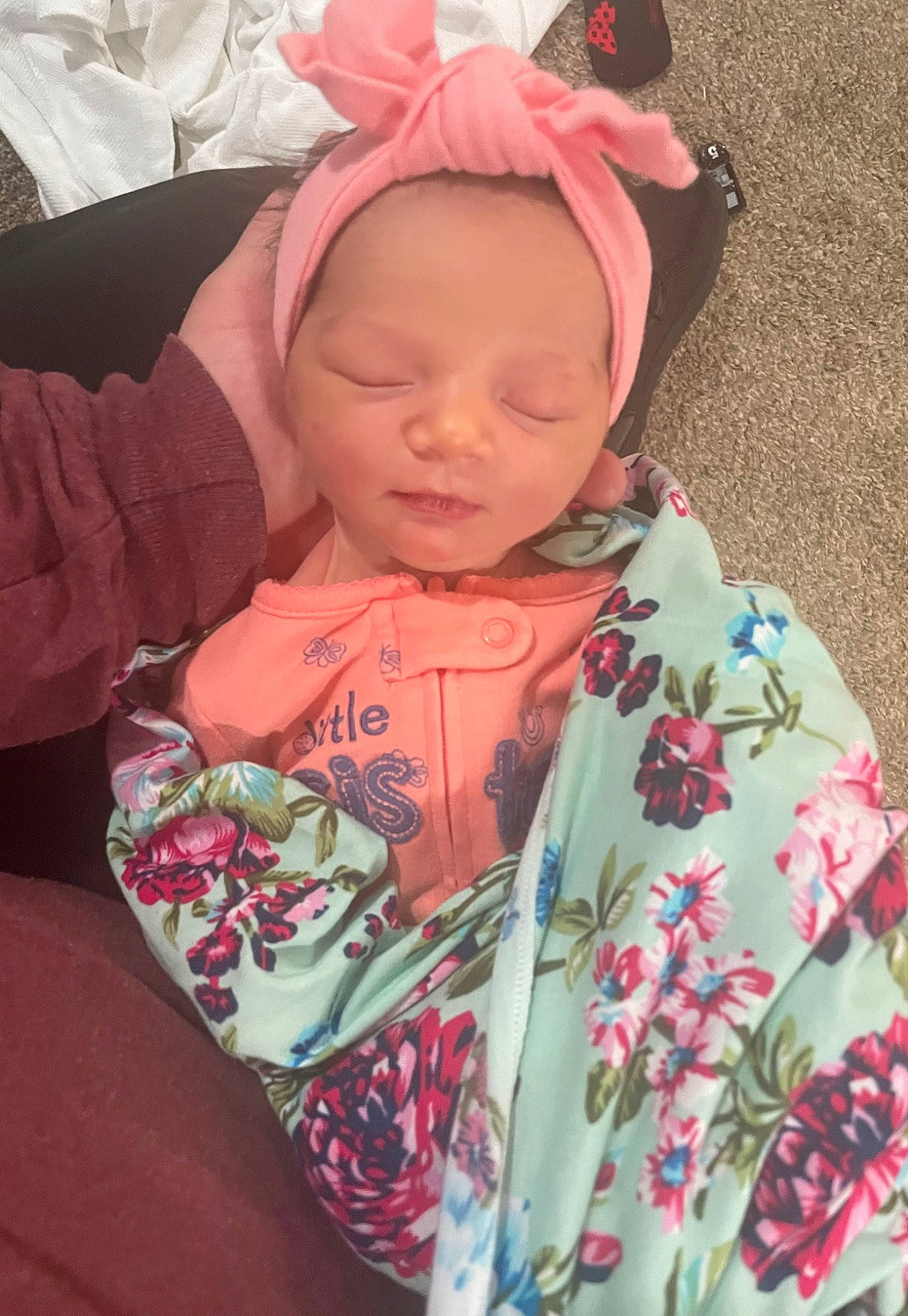 Kinsley is registered to the contest to win money with this photo: baby, baby_toddler_clothing, cheek, eye, face, happy, head, linens, lip, magenta, neck, pattern, peach, person, pink, plant, skin, sleeve, t_shirt, textile