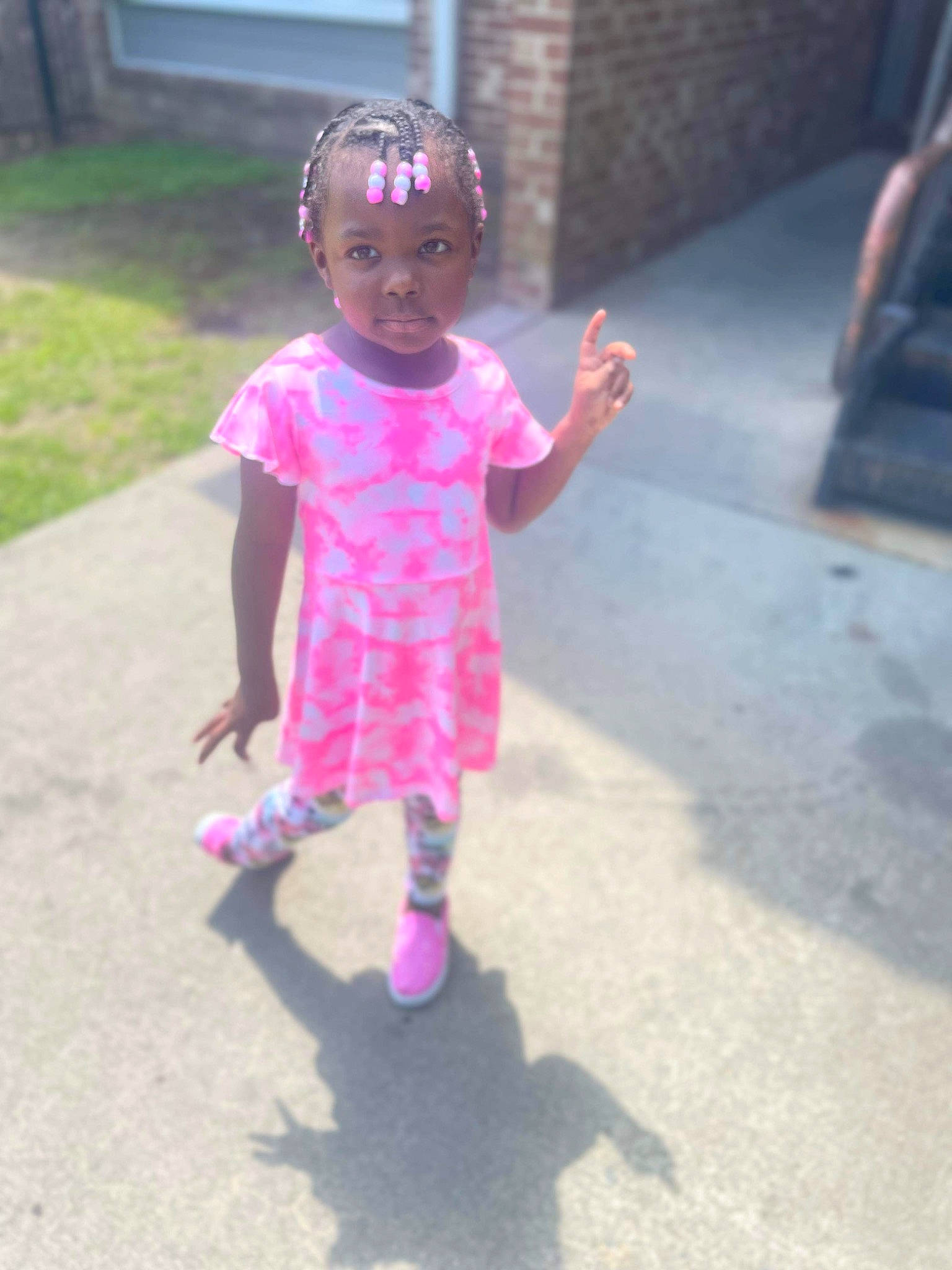 Kamilla Rose is registered to the contest to win money with this photo: asphalt, baby_toddler_clothing, child, fashion_accessory, fun, grass, happy, hat, magenta, pattern, person, pink, play, purple, recreation, road, road_surface, sidewalk, sleeve, toddler