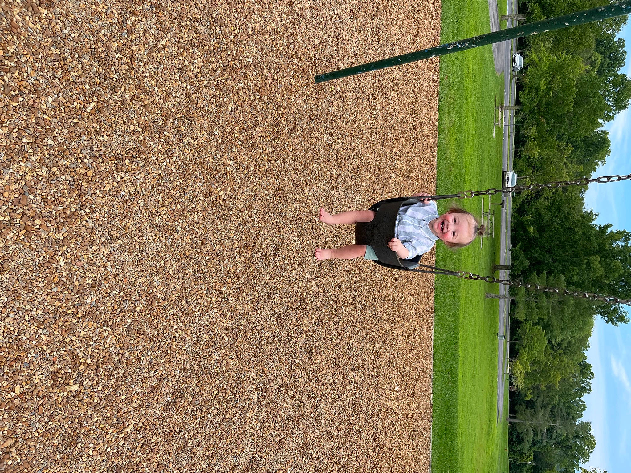 Kaycee joined the competition — help win amazing prizes! asphalt, concrete, field, fun, grass, joy, landscape, leisure, people_in_nature, person, plant, pole, public_utility, recreation, shadow, shrub, sky, slope, soil, street_light