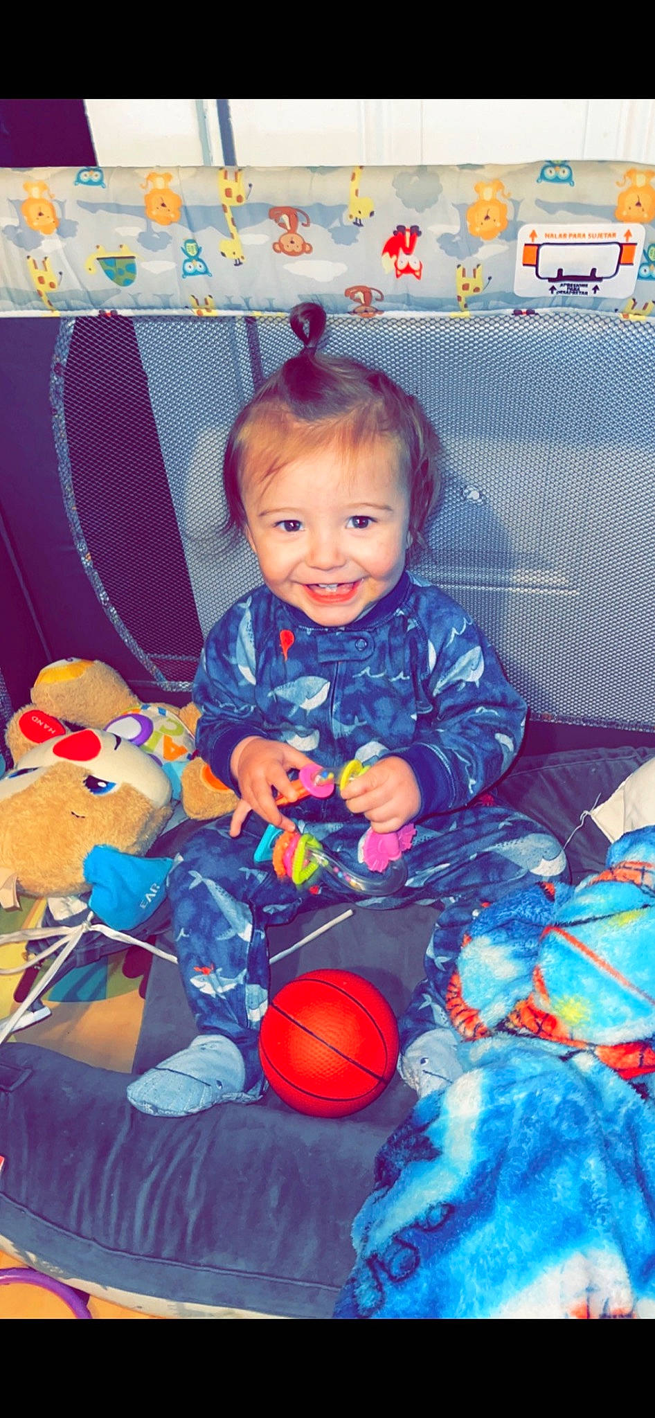 Kaycee joined the competition — help win amazing prizes! baby, baby_products, baby_toddler_clothing, baby_toys, ball, child, electric_blue, face, fun, happy, head, iris, joy, orange, person, play, purple, sitting, smile, textile