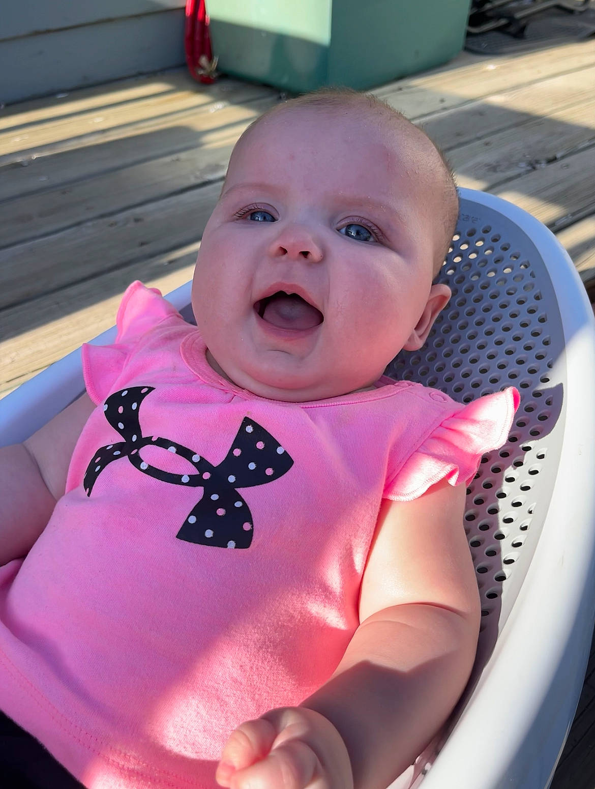 Cora is registered to the contest to win money with this photo: baby, baby_products, baby_safety, baby_toddler_clothing, carmine, cheek, child, circle, comfort, eyelash, fun, happy, magenta, pattern, person, pink, sitting, sleeve, smile, thumb
