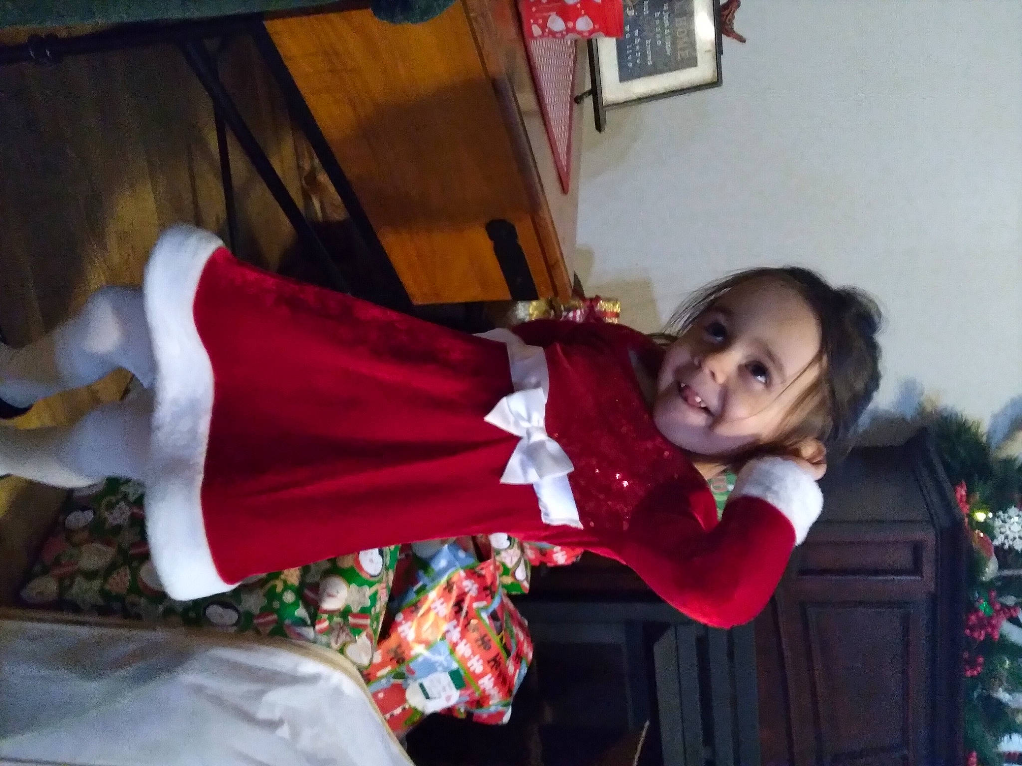 Shelby joined the competition — help win amazing prizes! child, christmas_eve, costume, event, fun, happy, holiday, human_leg, joy, magenta, person, room, sitting, smile, temple, thigh, toddler, tradition, tree, vacation