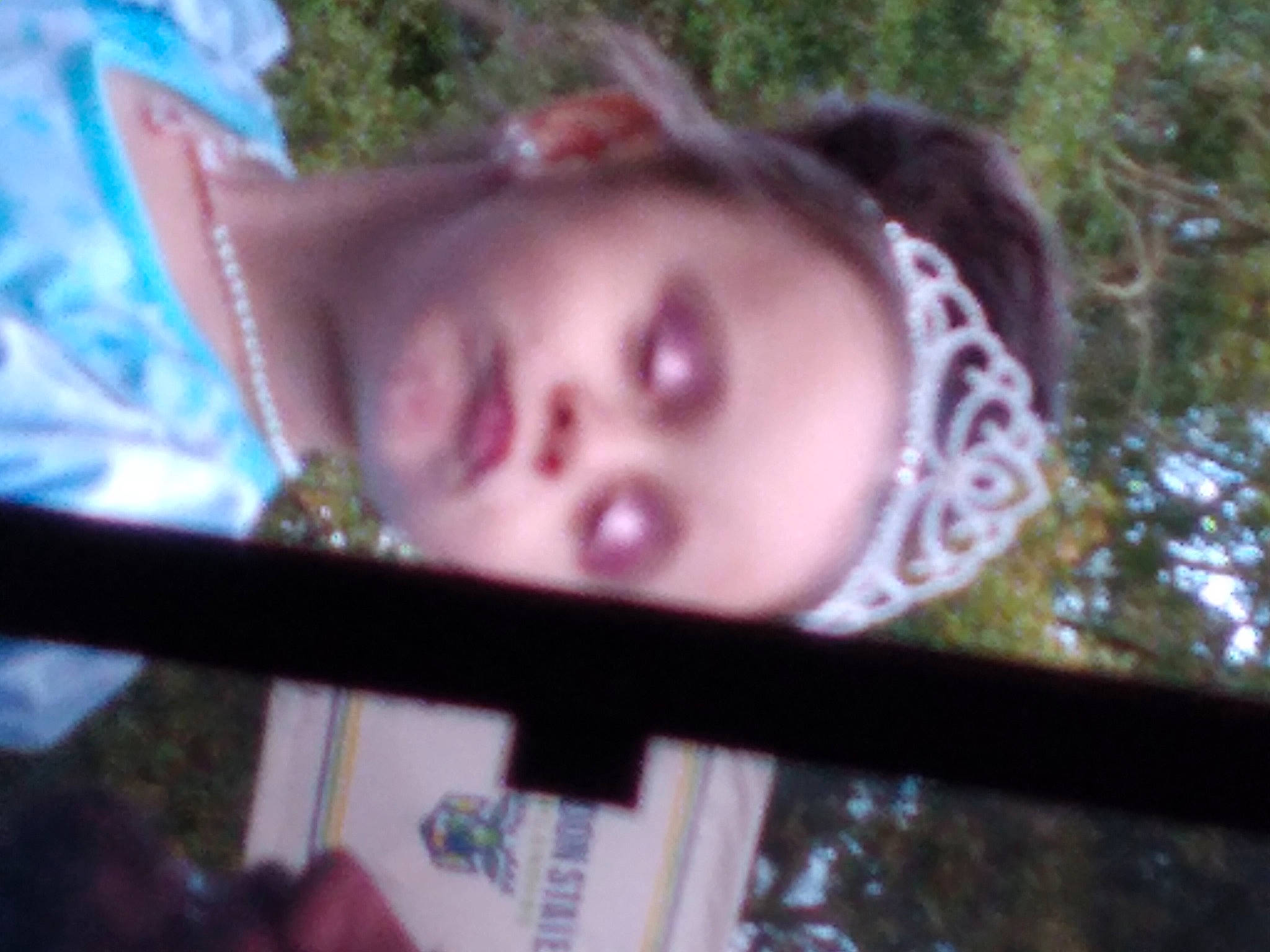 Shelby is registered to the contest to win money with this photo: black_hair, cheek, child, eyebrow, eyelash, eyewear, fashion_accessory, fun, grass, lip, magenta, nose, pattern, person, plant, reflection, tree