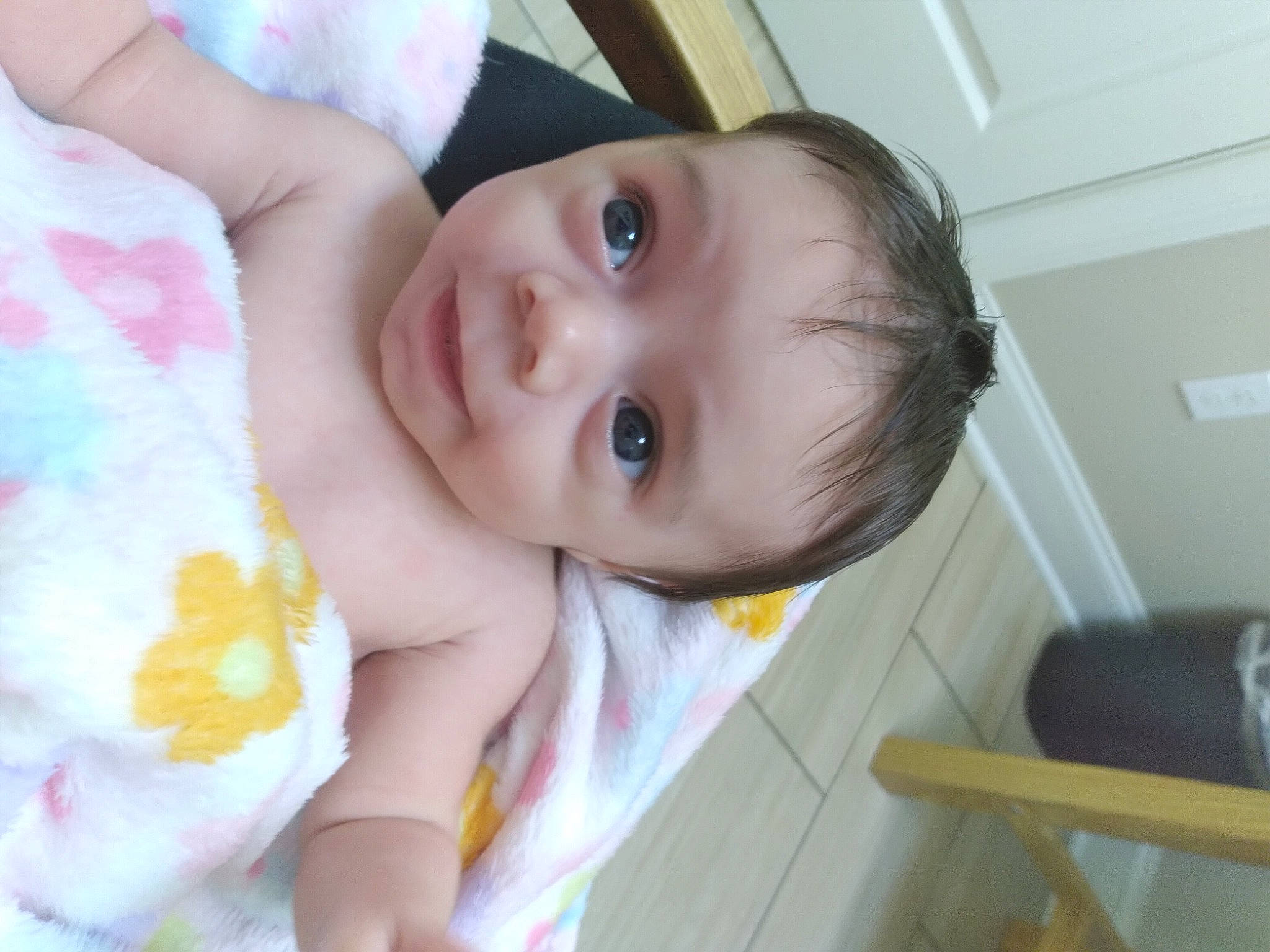 Stormy is registered to the contest to win money with this photo: arm, baby, baby_products, baby_toddler_clothing, cheek, eyelash, face, facial_expression, finger, hand, happy, head, iris, lip, mouth, nose, person, skin, smile, thumb