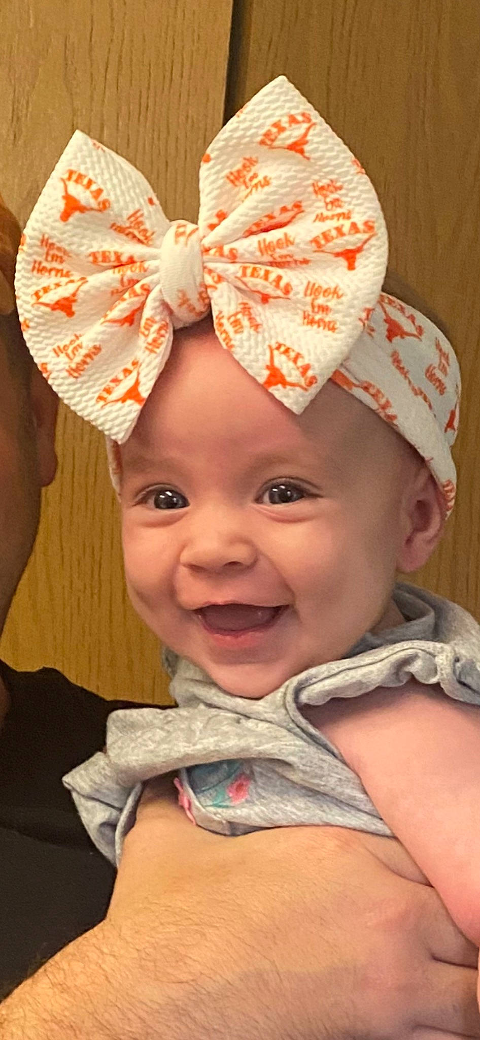 Gwendolyn is registered to the contest to win money with this photo: cheek, chin, eye, face, glasses, hairstyle, happy, head, headgear, headwear, human_body, iris, lip, nose, organ, outerwear, person, pink, skin, smile