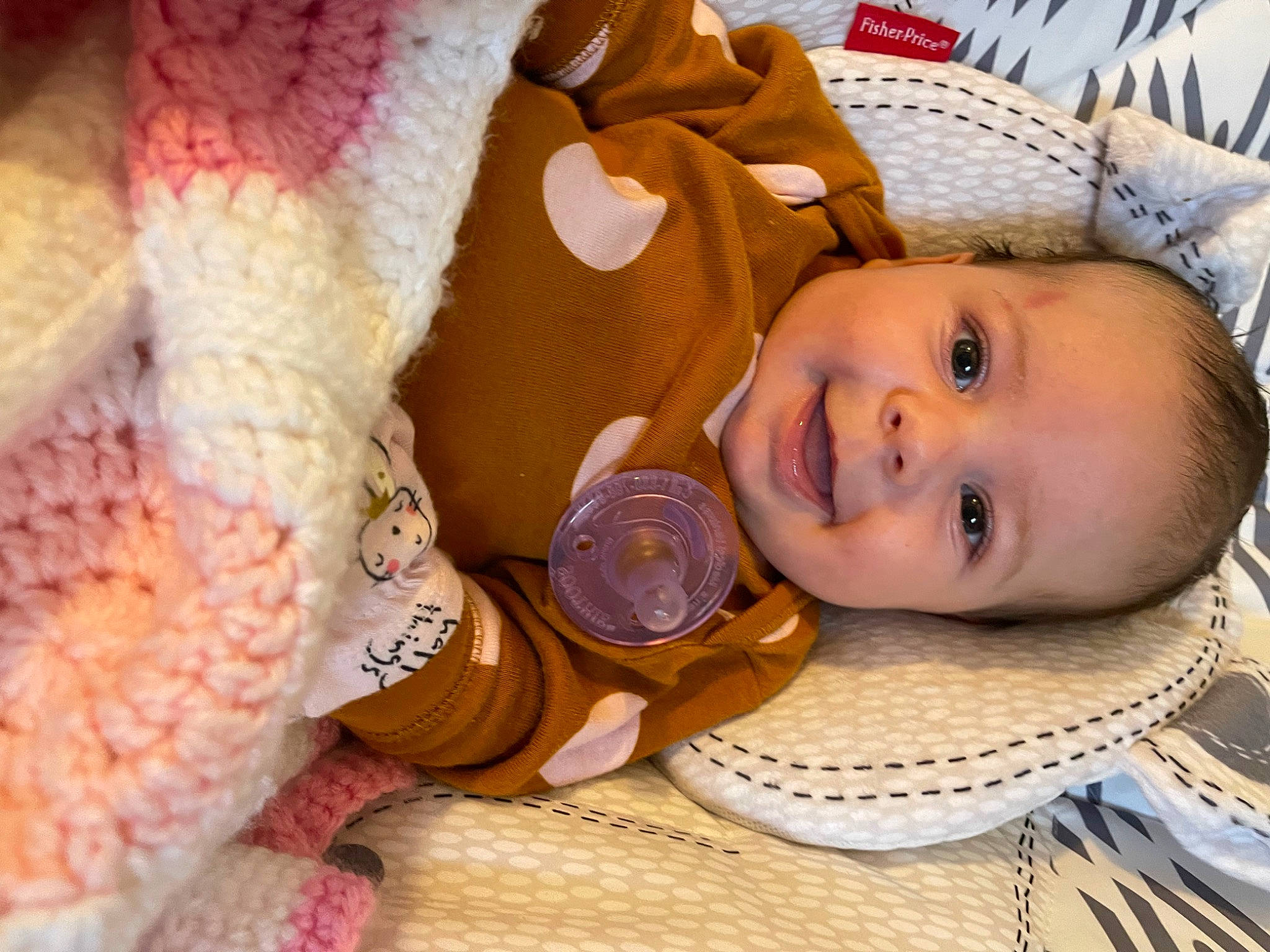 Kahlani joined the competition — help win amazing prizes! baby, baby_products, baby_sleeping, baby_toddler_clothing, cap, child, close_up, comfort, fashion_accessory, happy, headgear, joy, linens, mammal, pattern, person, room, skin, smile, textile