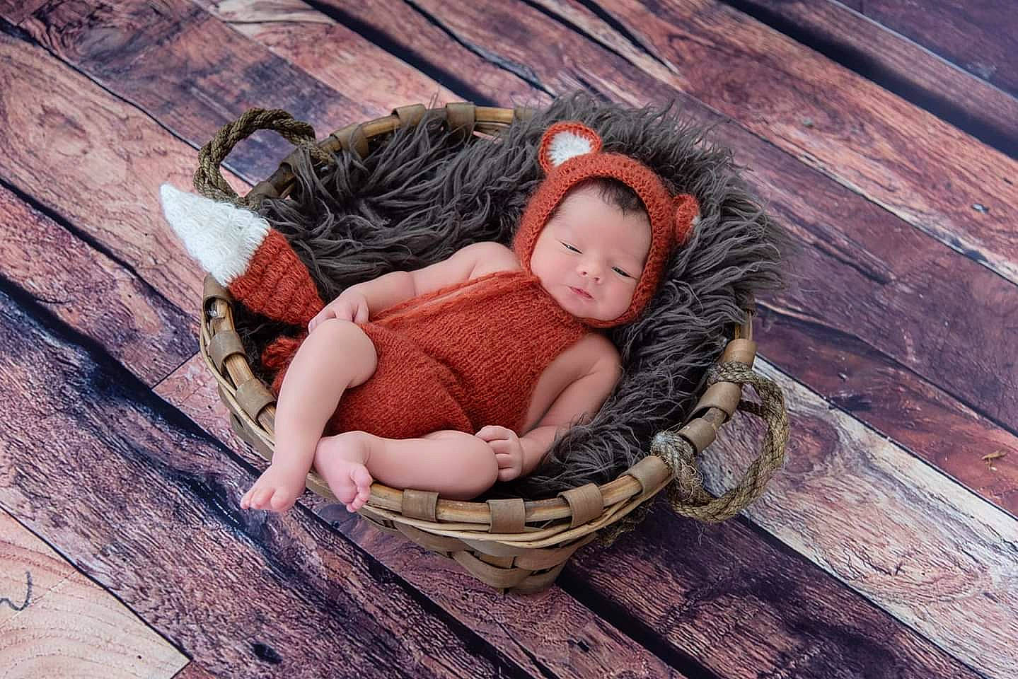 Jackson is registered to the contest to win money with this photo: baby, child, fictional_character, floor, flooring, person, photography, sleep, tree, wood
