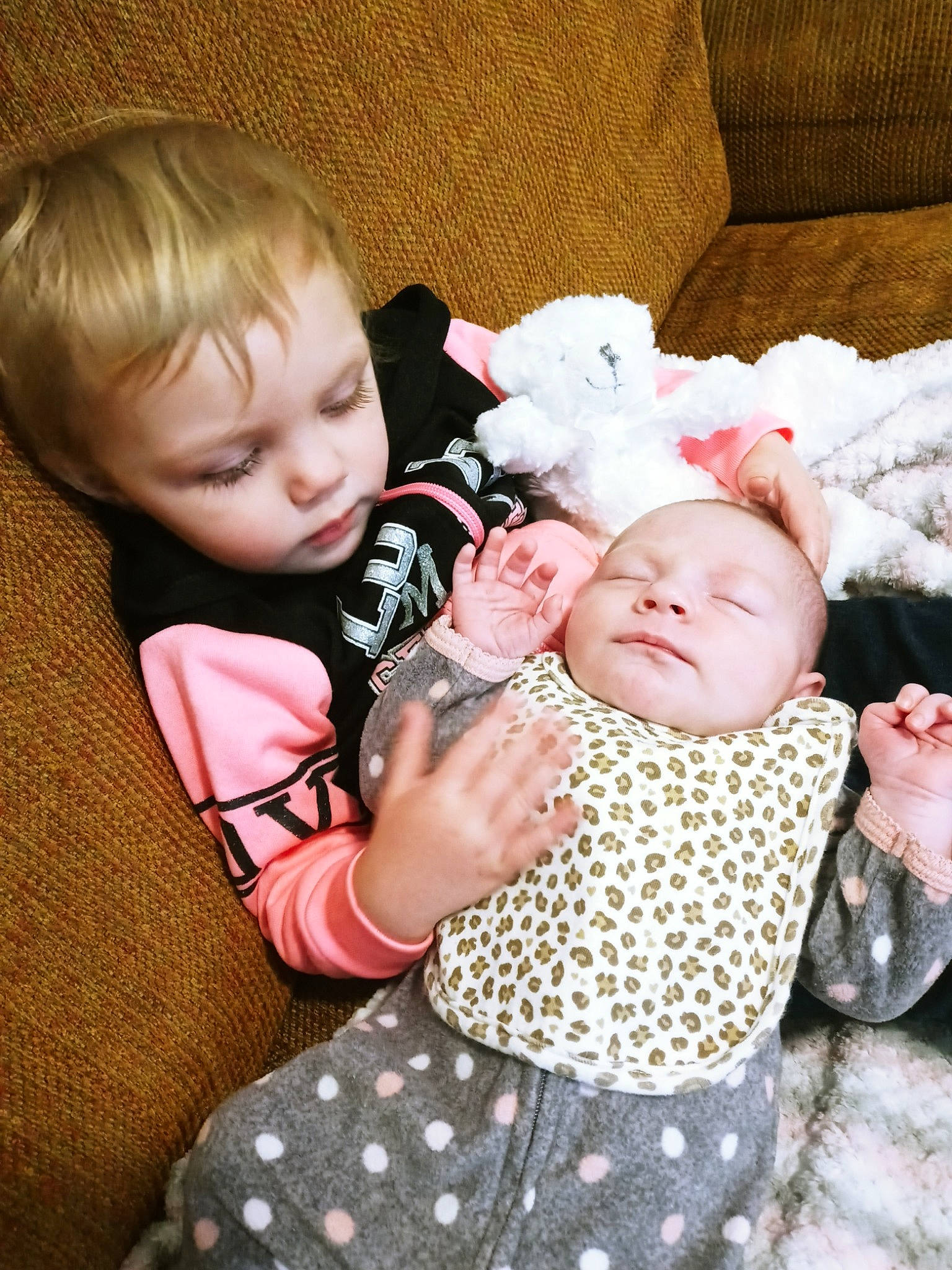 Charlie joined the competition — help win amazing prizes! baby, baby_toddler_clothing, beauty, cheek, child, comfort, couch, eye, interaction, mammal, pattern, people, person, photograph, pink, product, red, sitting, skin, sleeve