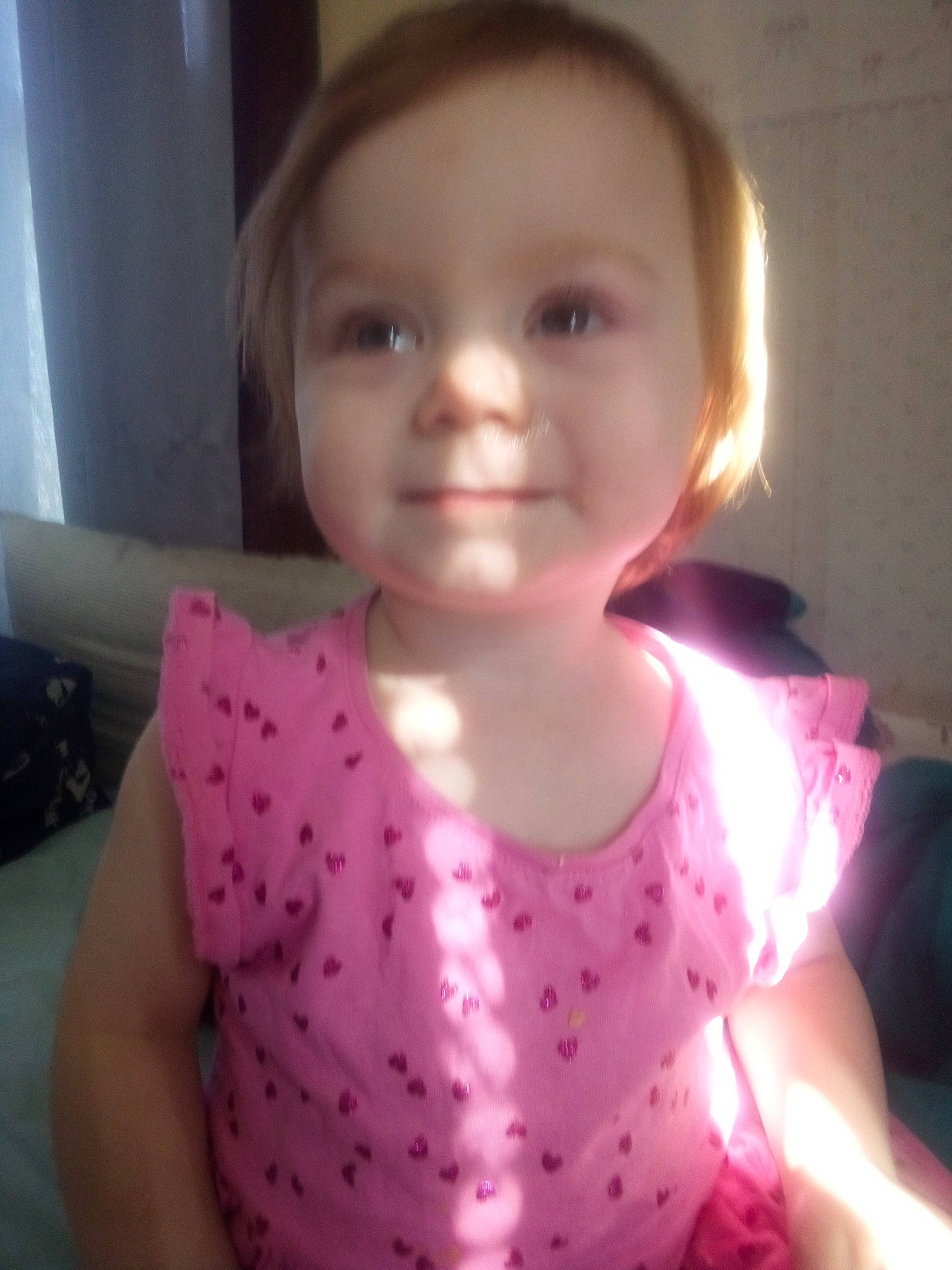 Elizabeth is registered to the contest to win money with this photo: baby, baby_toddler_clothing, cheek, dress, face, finger, happy, head, iris, joy, lip, magenta, mouth, neck, person, pink, skin, sleeve, smile, standing