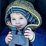 Carson is registered to the contest to win money with this photo: toddler, child, binoculars, hooded_jacket, blue_eyes, striped_hat, winter_clothing, cozy, curious, hands, portrait, baby, cute, outdoor_gear, warm, face, smile, young_child, close_up, exploration