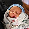Zander joined the competition — help win amazing prizes! newborn, baby, sleeping, blanket, cap, infant, person, closeup, comfort, warm, soft, wrapped, peaceful, indoors, human, portrait, resting, cute, tender, family