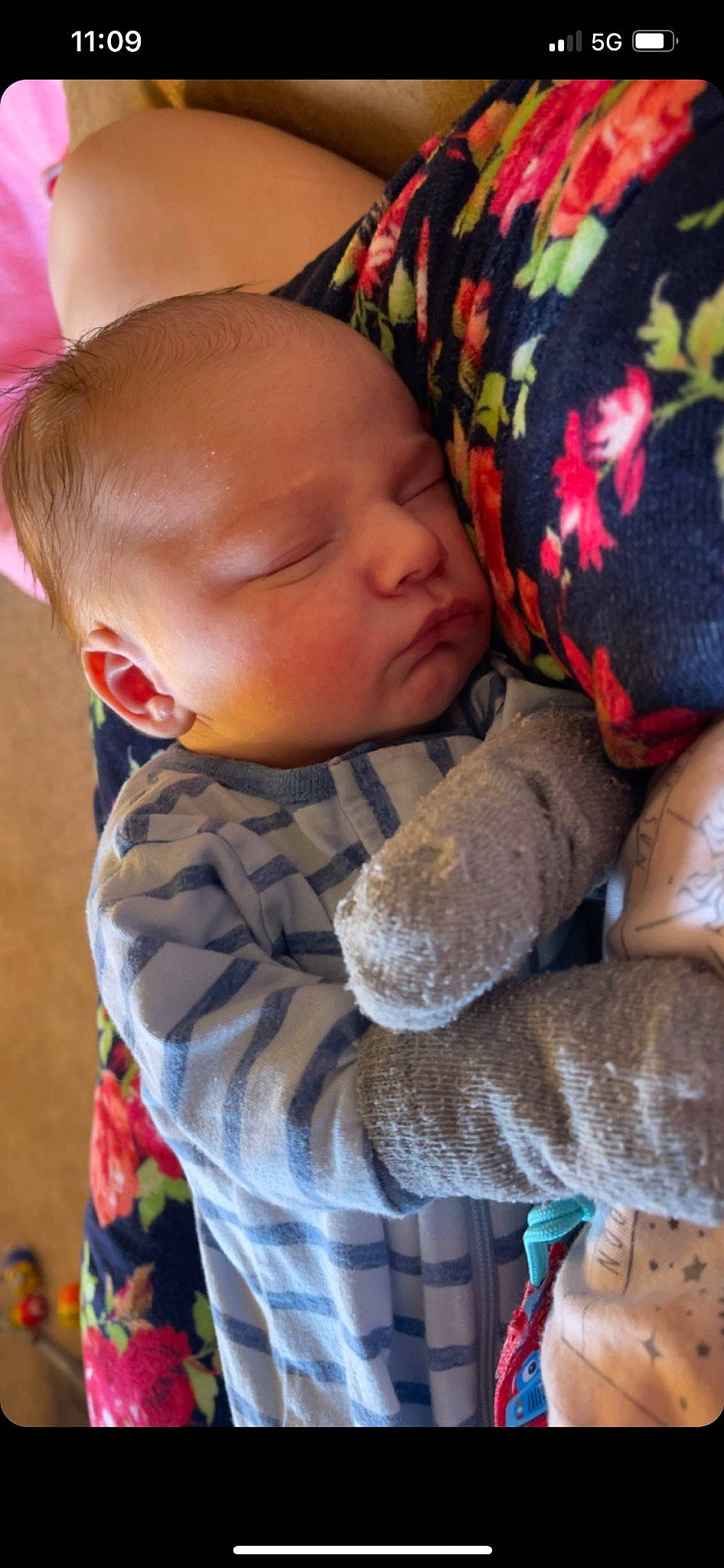 Dawson is registered to the contest to win money with this photo: baby, baby_sleeping, baby_toddler_clothing, cheek, child, comfort, finger, happy, linens, lip, mouth, nose, pattern, people, person, sitting, skin, sleeve, textile, toddler