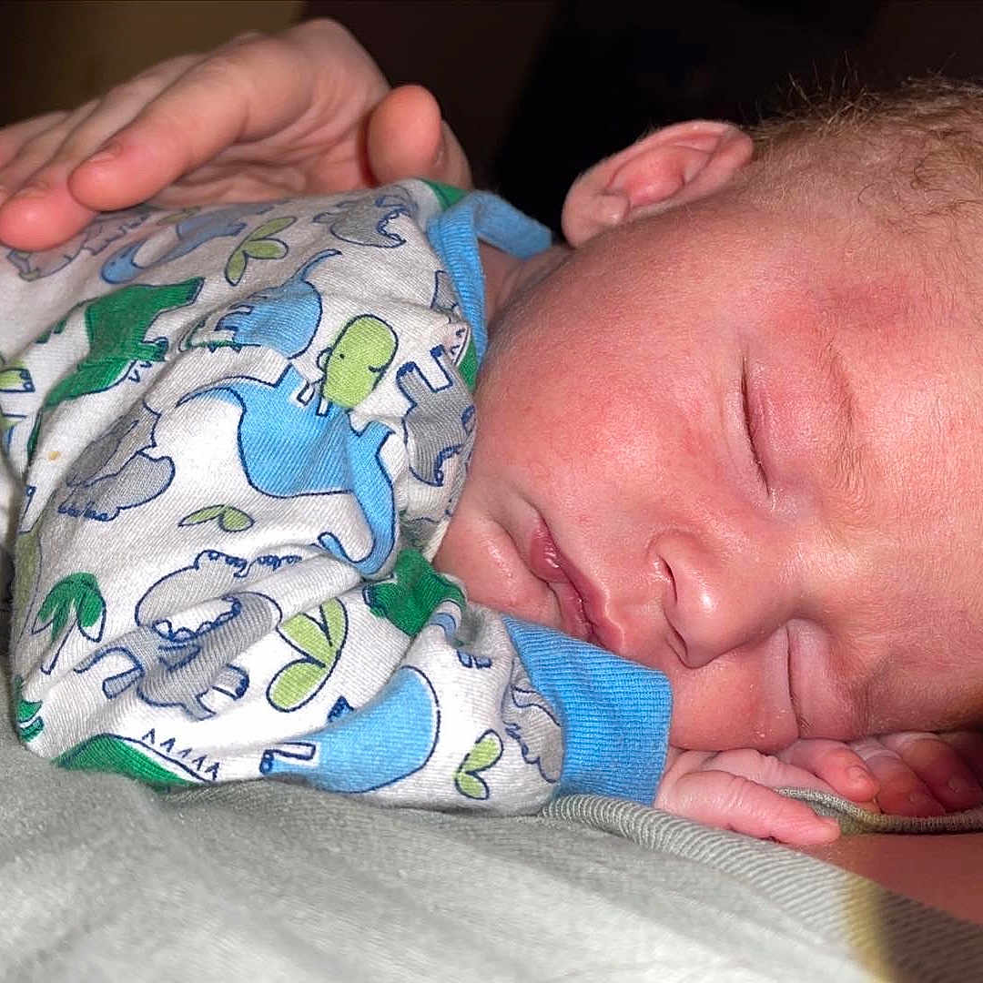 Dawson joined the competition — help win amazing prizes! baby, baby_sleeping, baby_toddler_clothing, bedtime, cheek, child, comfort, ear, finger, hand, iris, linens, mammal, mouth, nail, nap, nose, skin, thumb, toddler