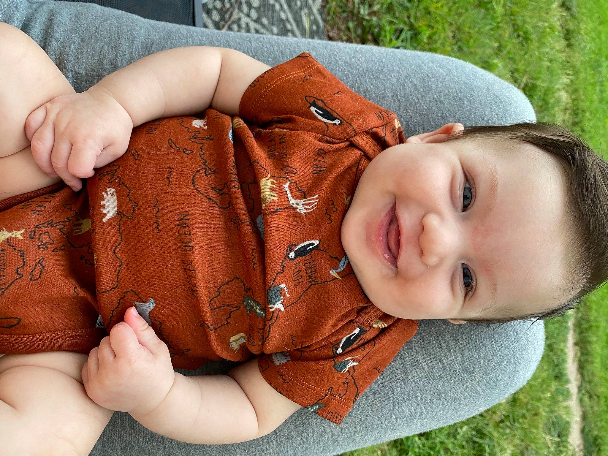 Holden is registered to the contest to win money with this photo: baby_toddler_clothing, cheek, comfort, eye, finger, glasses, grass, hand, happy, joy, lip, muscle, neck, nose, people_in_nature, person, plant, skin, sleeve, smile
