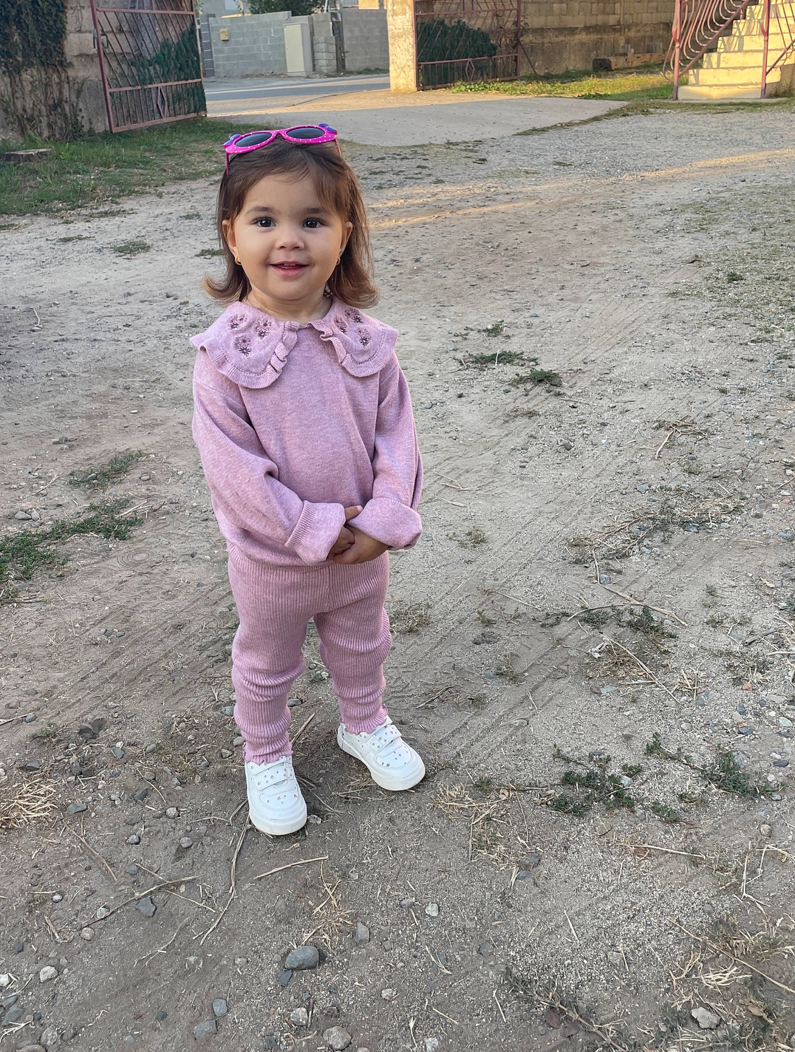 Leia Ana-maria participe au concours pour gagner de l'argent avec cette photo : asphalt, boot, face, fun, grass, happy, joy, landscape, leaf, leisure, magenta, outerwear, people_in_nature, person, plant, recreation, road_surface, smile, soil, toddler