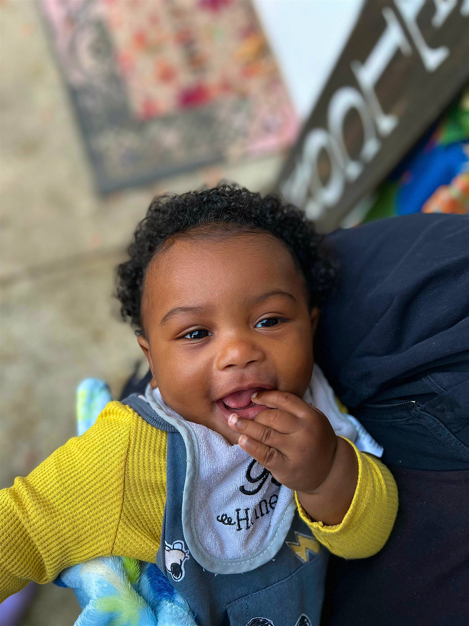Jeremiah is registered to the contest to win money with this photo: baby, baby_toddler_clothing, cheek, child, eating, fun, gesture, happy, leisure, nose, person, sitting, skin, smile, thumb, toddler, travel, vacation