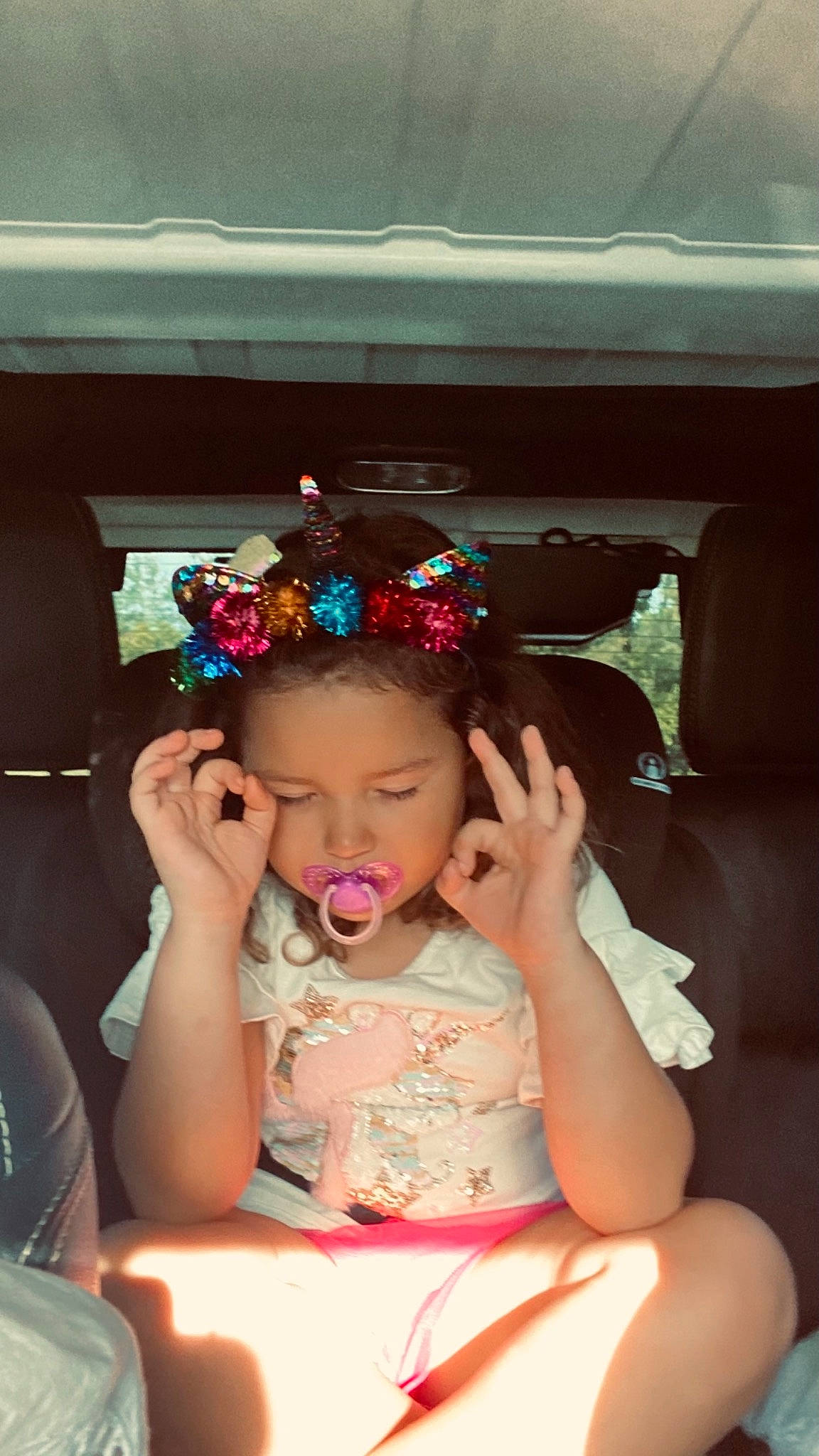 Gigi is registered to the contest to win money with this photo: audio_equipment, baby, car_seat, chair, child, drinkware, ear, event, eyelash, eyewear, fashion_accessory, fun, happy, headpiece, jewellery, leisure, nail, person, sitting, toddler