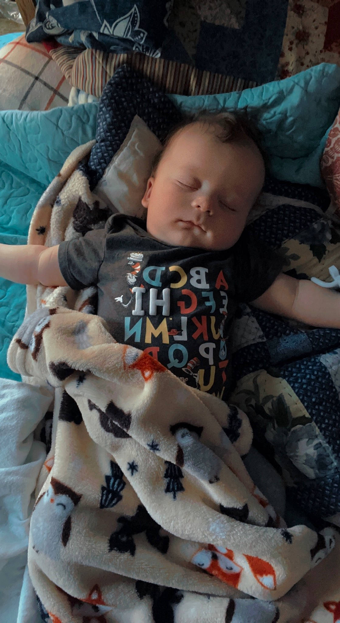 Adam is registered to the contest to win money with this photo: baby, baby_products, baby_toddler_clothing, carmine, cheek, child, comfort, head, lap, linens, nap, pattern, person, room, sitting, skin, sleep, toddler, tree