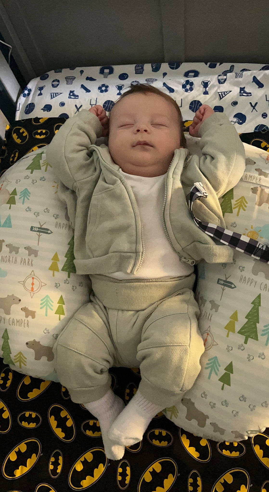 Adam is registered to the contest to win money with this photo: baby, baby_products, baby_safety, baby_sleeping, baby_toddler_clothing, cheek, child, comfort, head, linens, pattern, person, room, sitting, sleeve, textile, thumb, toddler