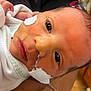 newborn, baby, infant, face, medical_tape, feeding_tube, hospital, closeup, eyes, skin, person, hand, blanket, healthcare, fragile, resting, cute, small, patient, care