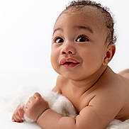 Desmond joined the competition — help win amazing prizes! baby, infant, child, cute, portrait, face, skin, eyes, smile, curly_hair, lying_down, soft_light, white_background, hands, expression, closeup, adorable, newborn, innocence, young_child