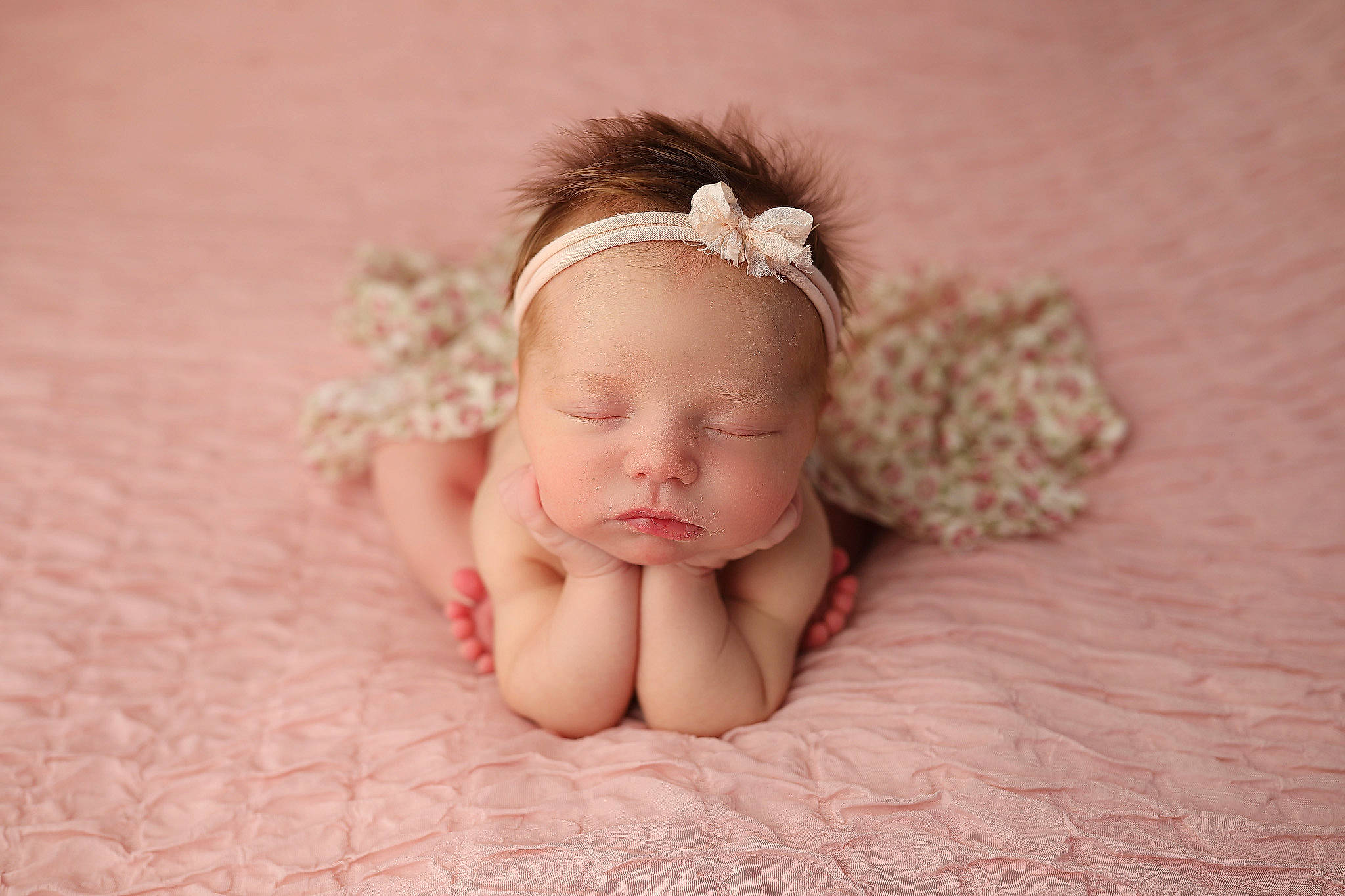 Memphis is registered to the contest to win money with this photo: arm, baby, baby_sleeping, baby_toddler_clothing, comfort, ear, eye, hand, happy, head, headband, headgear, headpiece, iris, jewellery, leg, person, petal, plant, toddler