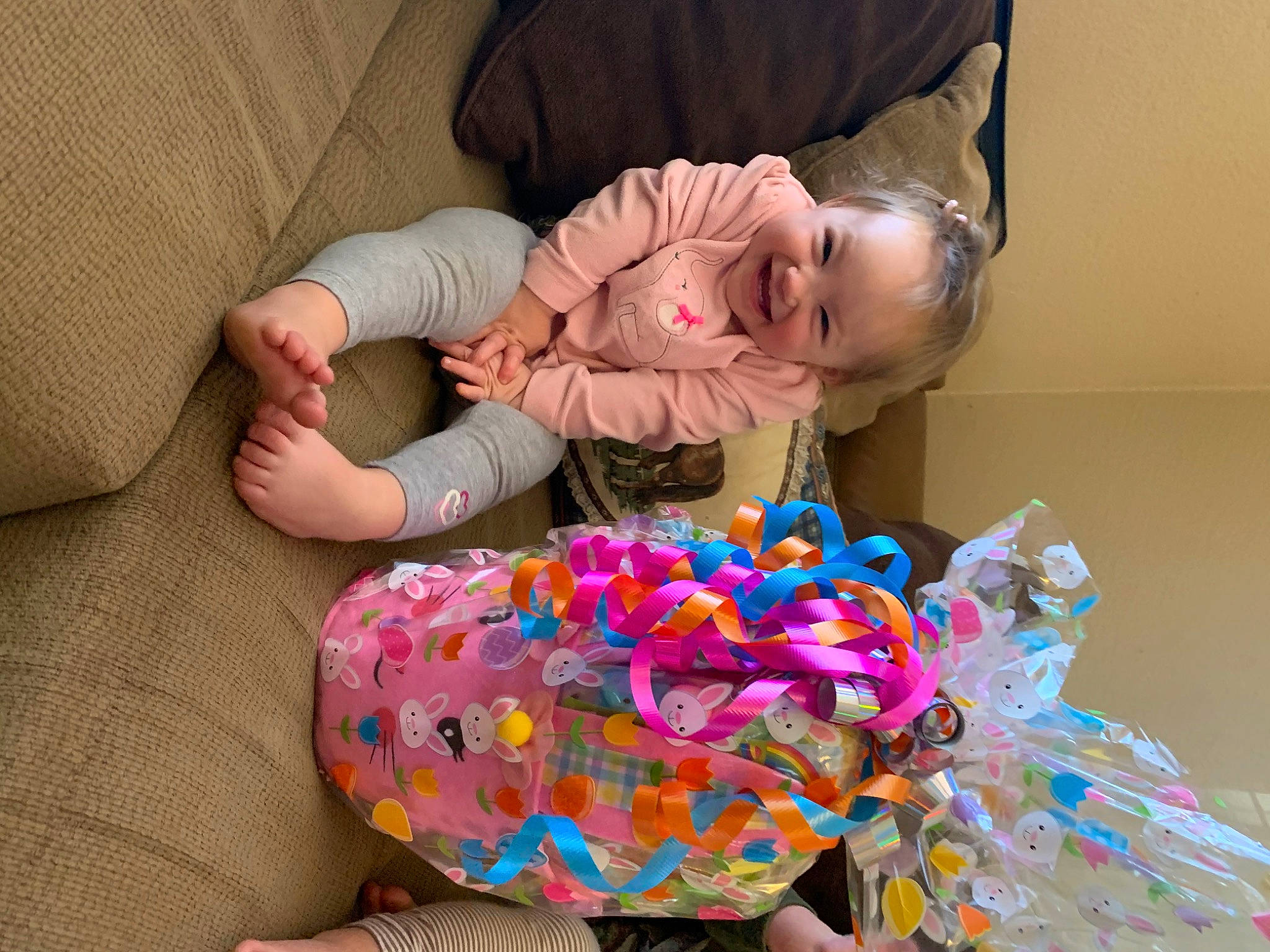 Memphis is registered to the contest to win money with this photo: baby, baby_products, baby_toddler_clothing, baby_toys, cheek, child, comfort, event, face, fun, headgear, joy, nail, pattern, person, pink, play, room, sitting, sleeve