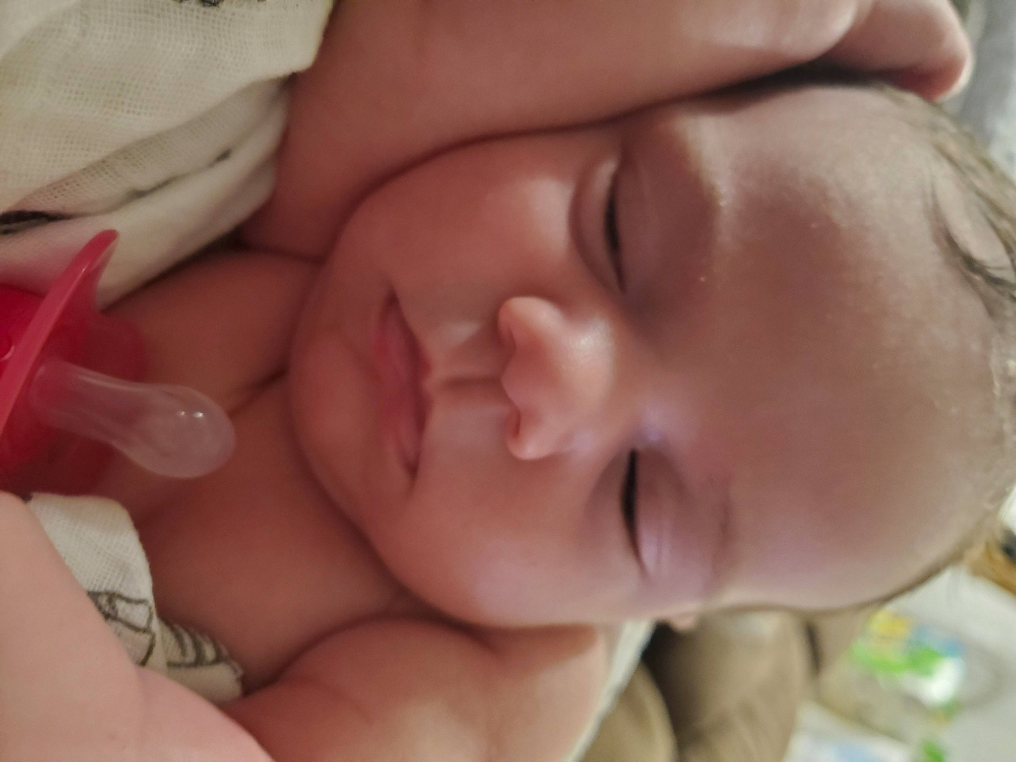 Coraline is registered to the contest to win money with this photo: baby, baby_sleeping, birth, cheek, child, chin, close_up, eye, face, finger, forehead, hand, head, lip, mouth, nap, nose, person, skin, sleep