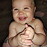baby, child, smiling, clapping, hands, teeth, face, skin, diaper, happy, indoor, flash, closeup, cute, infant, person, expression, light, cheeks, eyes