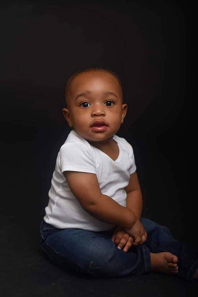 Kayden Cross joined the competition — help win amazing prizes! baby, baby_toddler_clothing, cheek, child, comfort, darkness, elbow, flash_photography, flooring, happy, person, portrait, portrait_photography, sitting, sleeve, t_shirt, toddler, wood