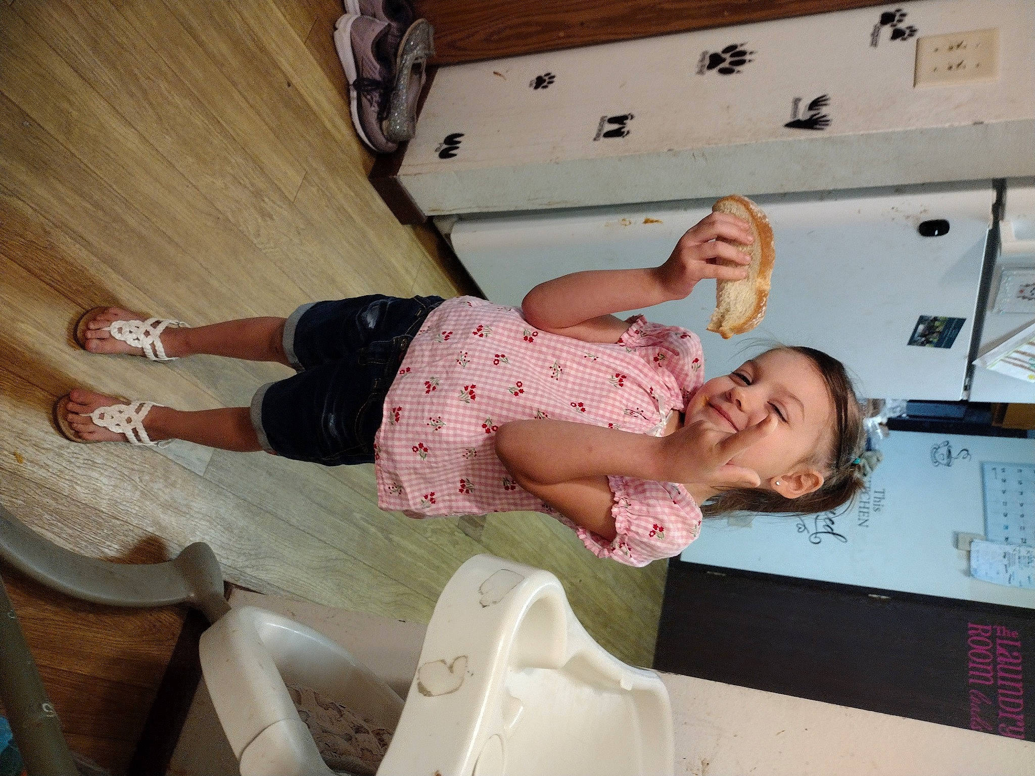 Brooklynn is registered to the contest to win money with this photo: baby_toddler_clothing, child, comfort, flooring, foot, fun, hardwood, human_leg, joint, joy, knee, leisure, pattern, person, room, sleeve, smile, sock, t_shirt, thigh