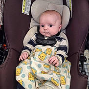 Dustin joined the competition — help win amazing prizes! baby, car_seat, blanket, winnie_the_pooh, child, infant, straps, clothing, cute, face, hands, indoor, seat, safety, cart, expression, person, young, portrait, comfort