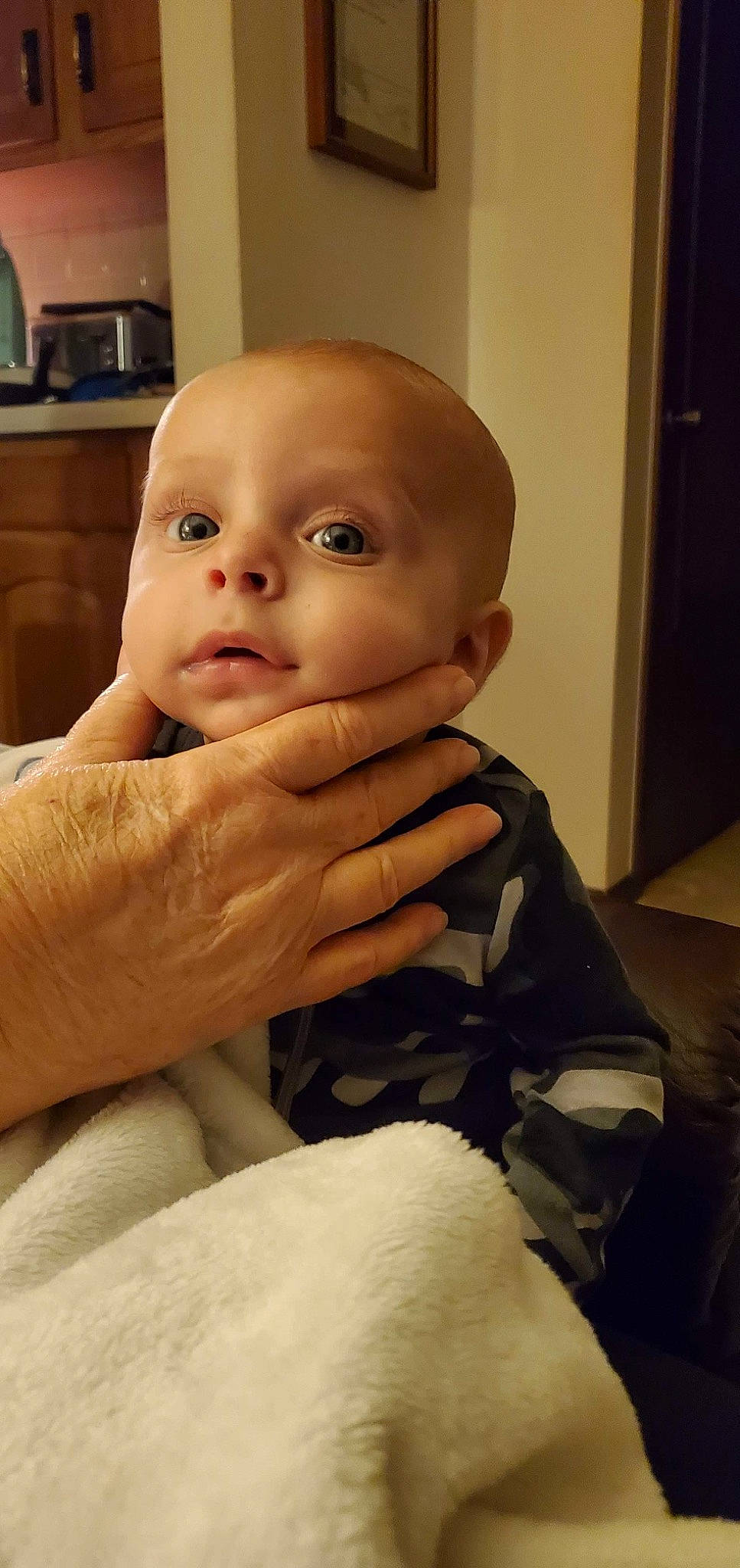 Crew is registered to the contest to win money with this photo: arm, baby, cheek, child, chin, comfort, eyebrow, eyelash, finger, gesture, head, iris, lip, nail, neck, nose, person, skin, sleeve, thumb