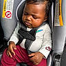 Marquiez joined the competition — help win amazing prizes! baby, child, sleeping, car_seat, seatbelt, curly_hair, clothing, white_shirt, maroon_pants, nike_logo, safety_label, infant, peaceful, indoors, hands, face, head, seat, resting, car_interior