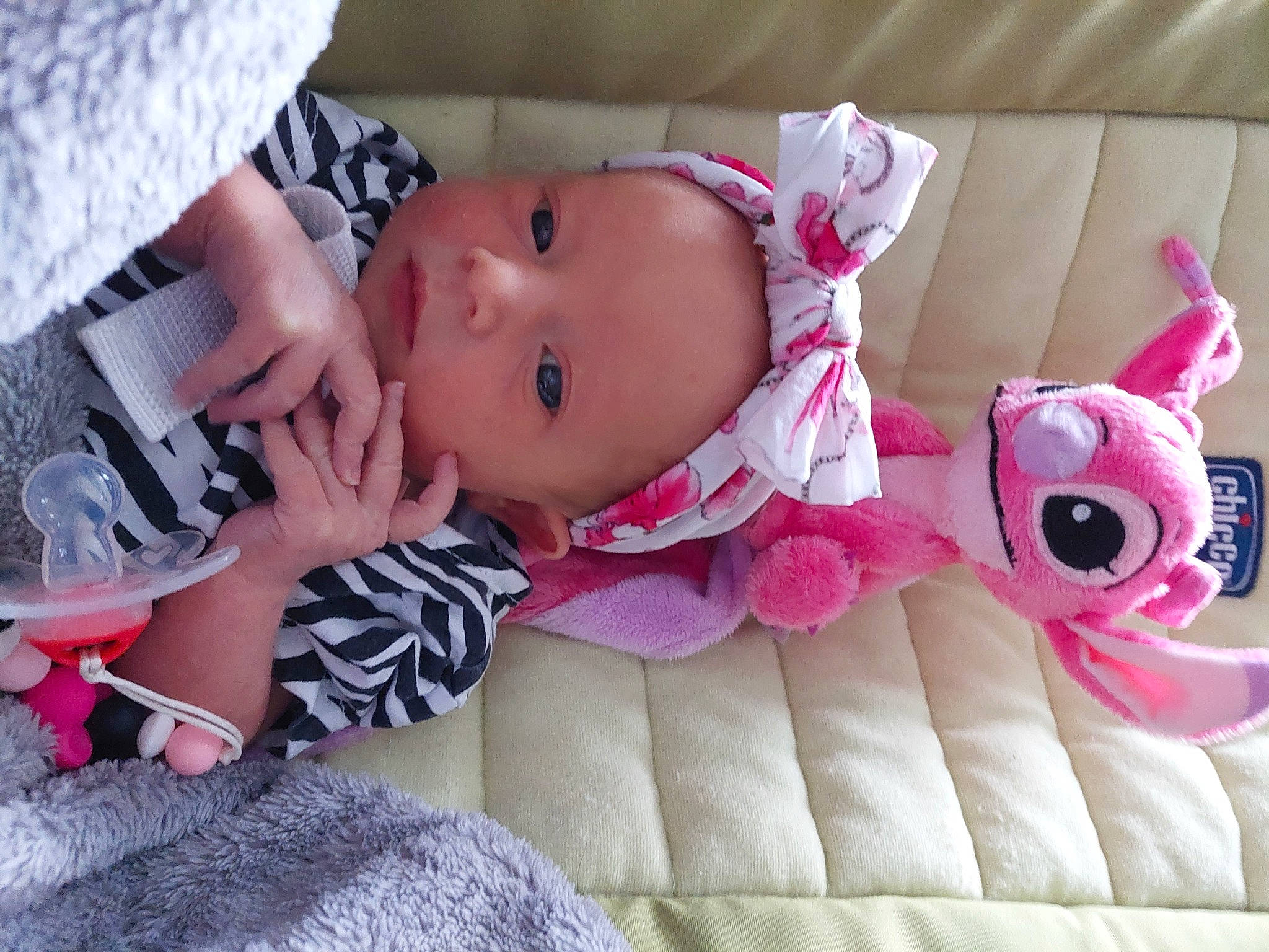 Athena participe au concours pour gagner de l'argent avec cette photo : baby, baby_products, baby_toddler_clothing, cheek, child, comfort, eye, eyelash, iris, linens, lip, magenta, nail, pattern, person, pink, room, skin, sleeve, textile