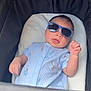 Mylo joined the competition — help win amazing prizes! baby, infant, sunglasses, blue_onesie, stroller, cute, tongue_out, child, young, infant_clothing, animal_print, relaxing, portrait, baby_face, summer, shade, small_hands, light, casual, adorable