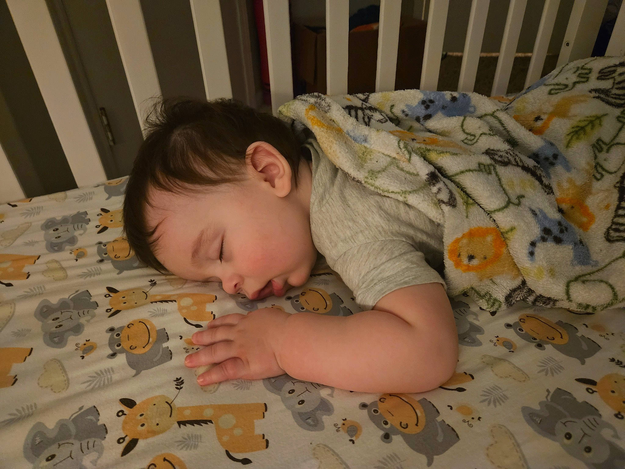 Alexander is registered to the contest to win money with this photo: baby, baby_products, baby_toddler_clothing, bedtime, cheek, child, comfort, eye, face, flooring, infant_bed, linens, pattern, person, room, sitting, skin, sleeve, textile, toddler