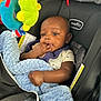 Kaisen joined the competition — help win amazing prizes! baby, car_seat, blanket, toy, infant, child, blue, black, hand, face, clothing, seat, cute, comfort, indoor, playful, young, person, childhood, soft