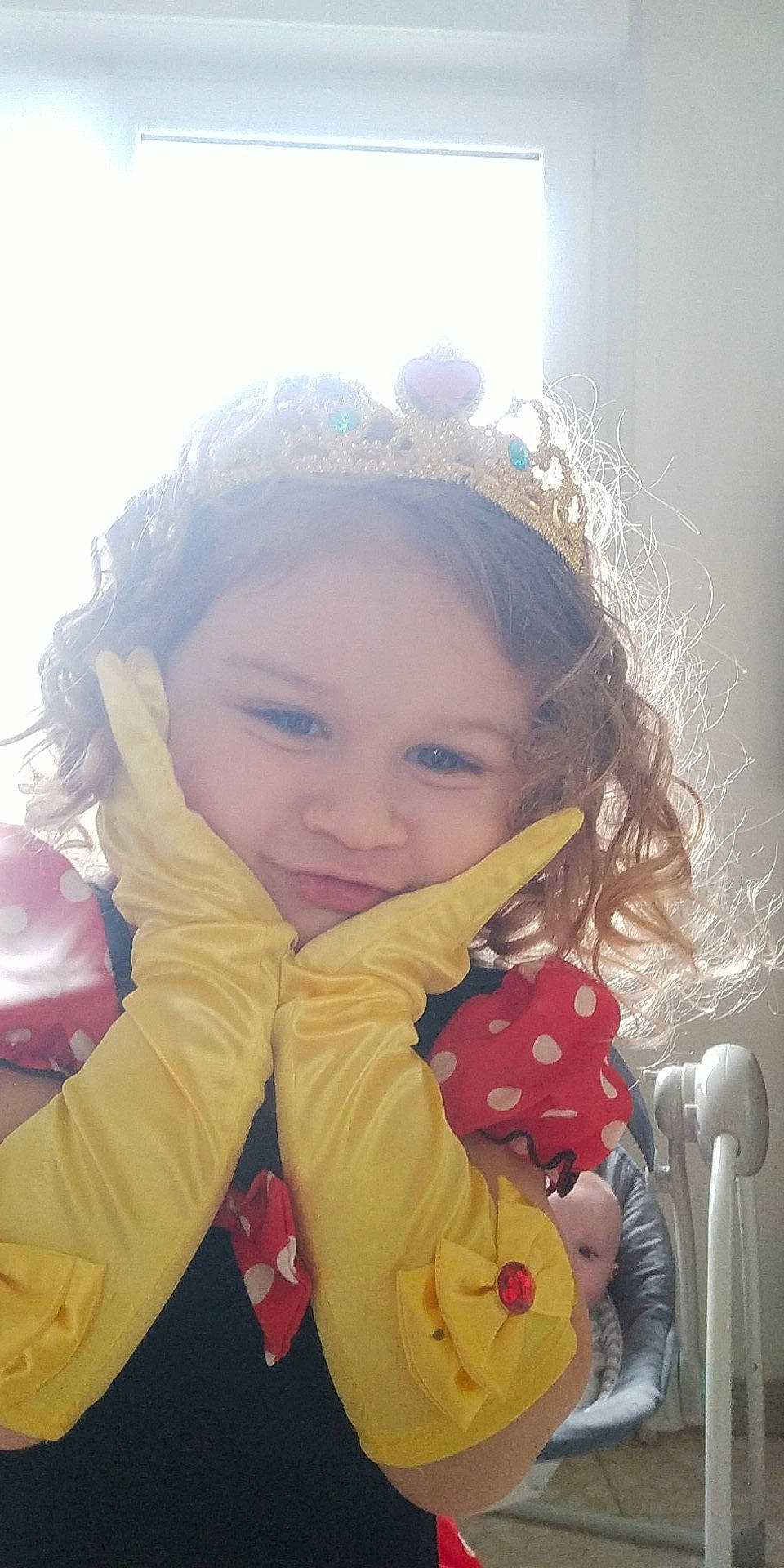 Gaëlle a rejoint le concours — aidez-le/la à gagner de superbes lots ! child, face, flash_photography, fun, glove, grass, happy, head, headpiece, iris, lip, nose, people_in_nature, person, play, portrait_photography, sitting, skin, toddler, toy