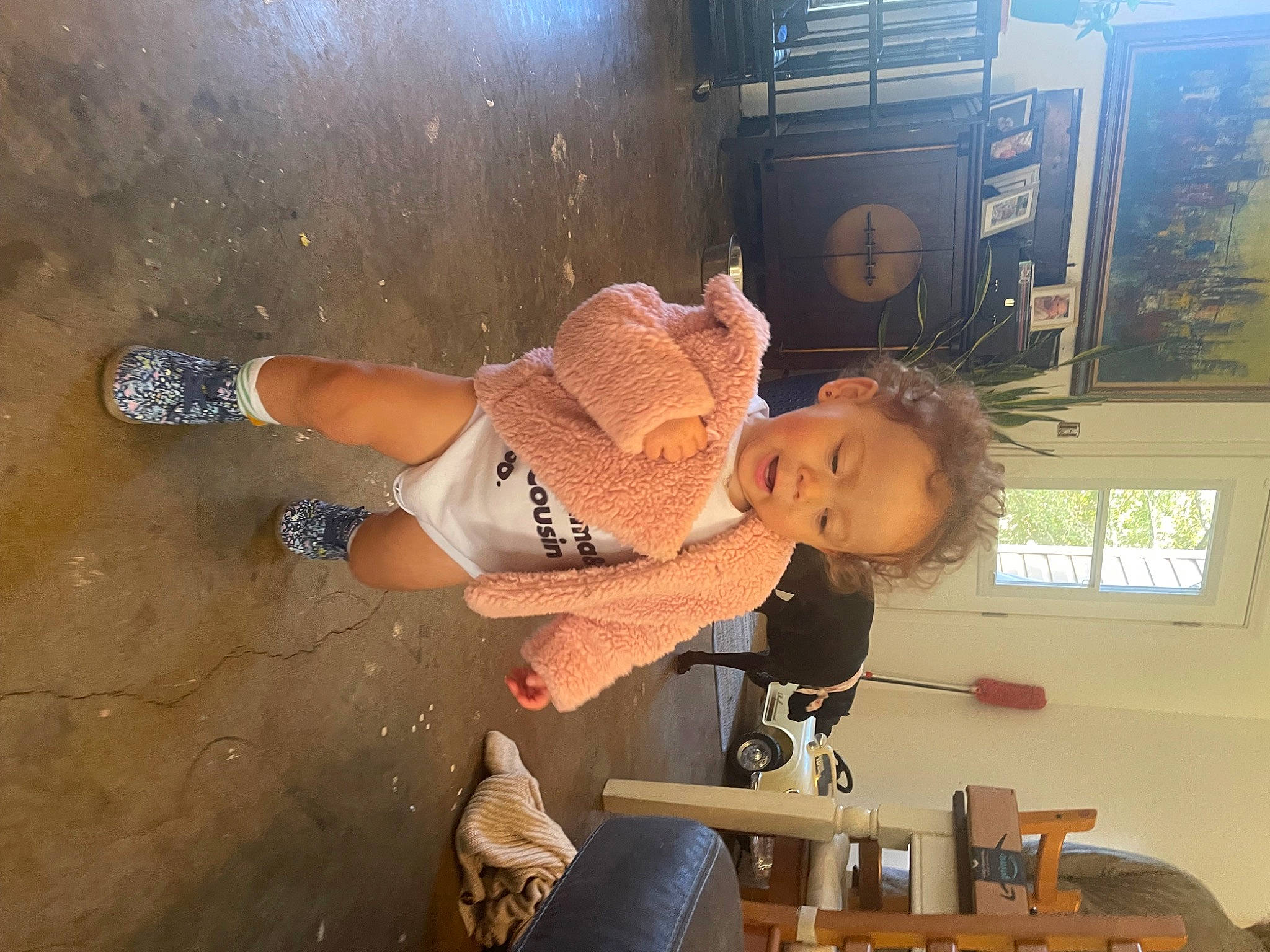 Emersyn joined the competition — help win amazing prizes! baby, child, elbow, fun, happy, hat, human_leg, knee, person, room, sitting, thigh, toddler, window, wrist