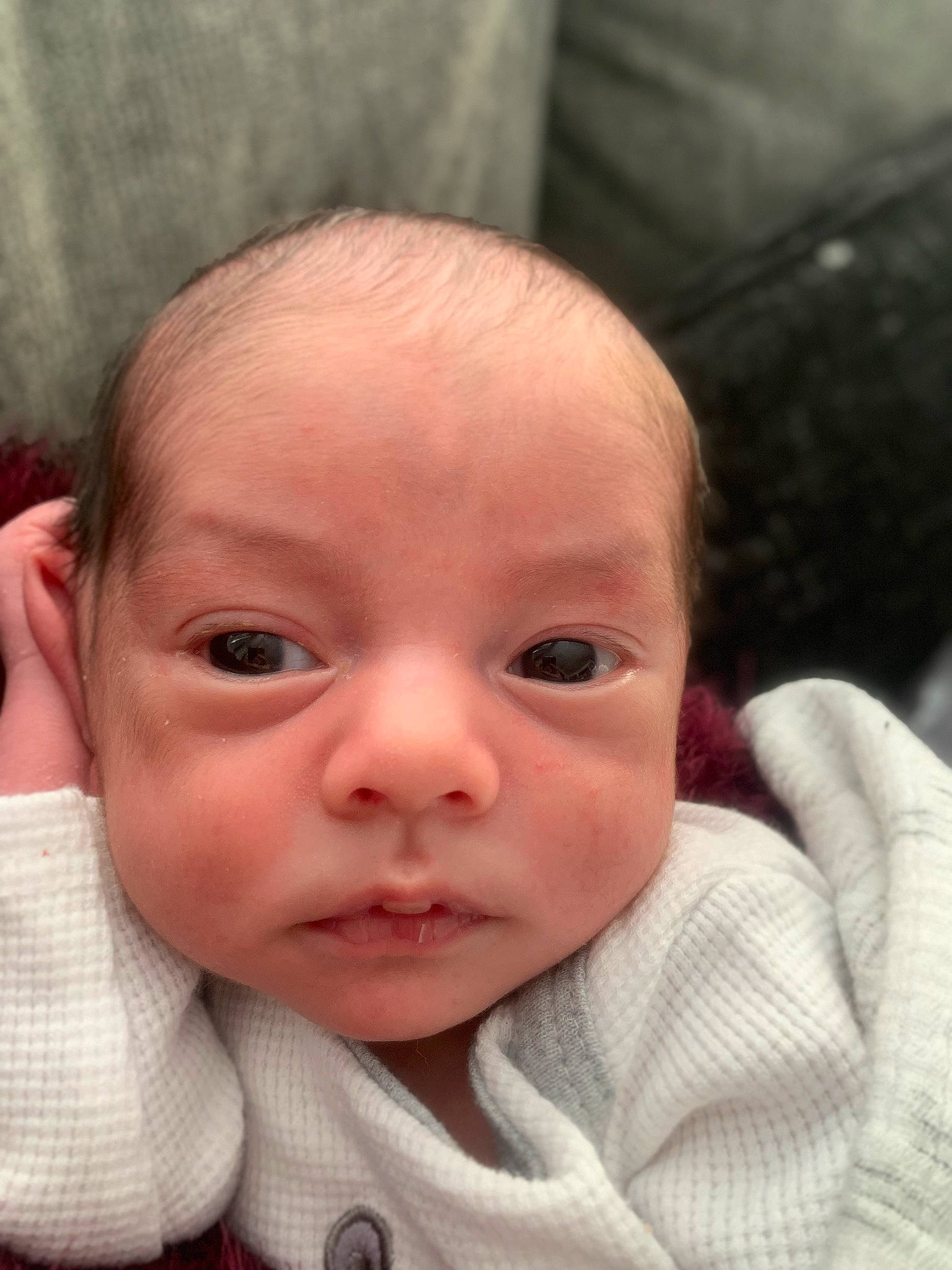 Gianni is registered to the contest to win money with this photo: baby, baby_toddler_clothing, cheek, child, close_up, comfort, ear, eyelash, finger, gesture, iris, lip, mouth, nail, neck, nose, person, skin, thumb, toddler