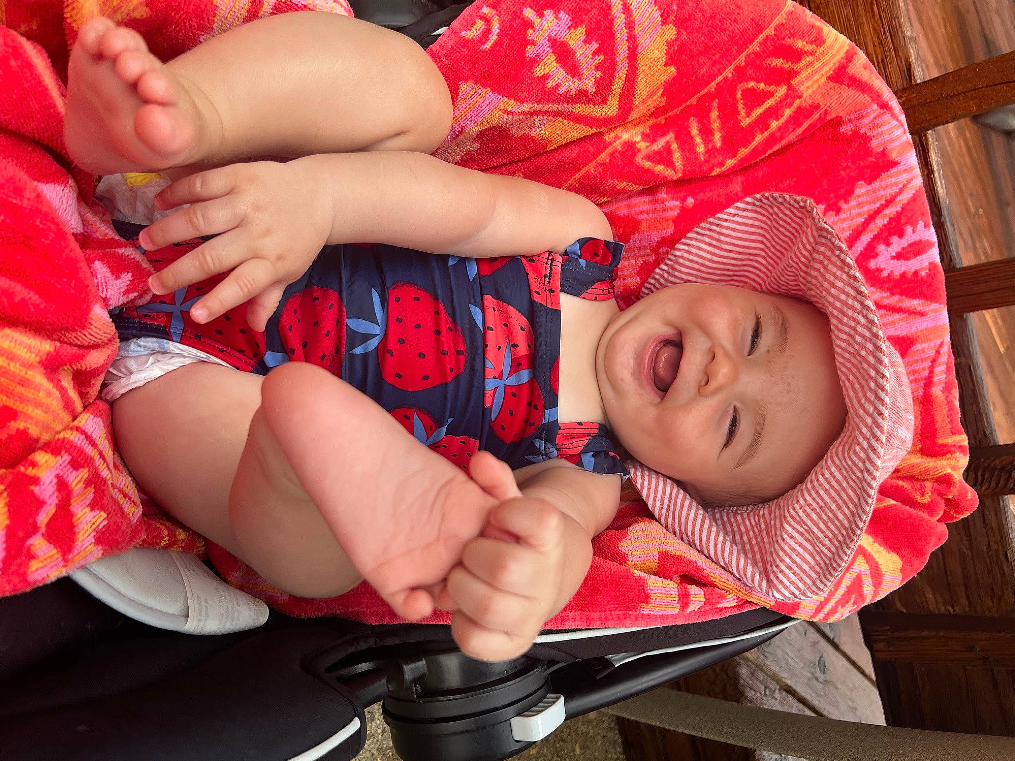 Sunny joined the competition — help win amazing prizes! baby, baby_toddler_clothing, cheek, comfort, face, facial_expression, finger, hand, head, headwear, human_body, joy, lap, mouth, nail, person, pink, product, red, skin