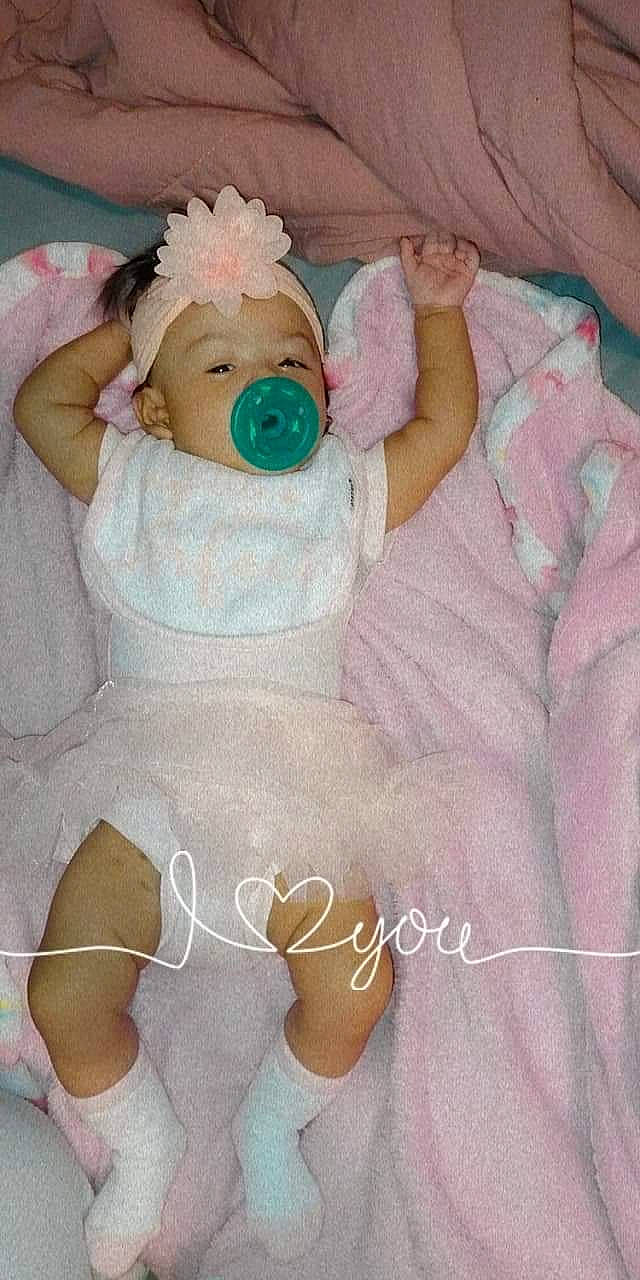 Ka'Lisa joined the competition — help win amazing prizes! baby, baby_products, baby_safety, baby_sleeping, baby_toddler_clothing, cheek, child, comfort, face, linens, pattern, person, pink, sitting, skin, sleeve, sock, textile, thigh, thumb